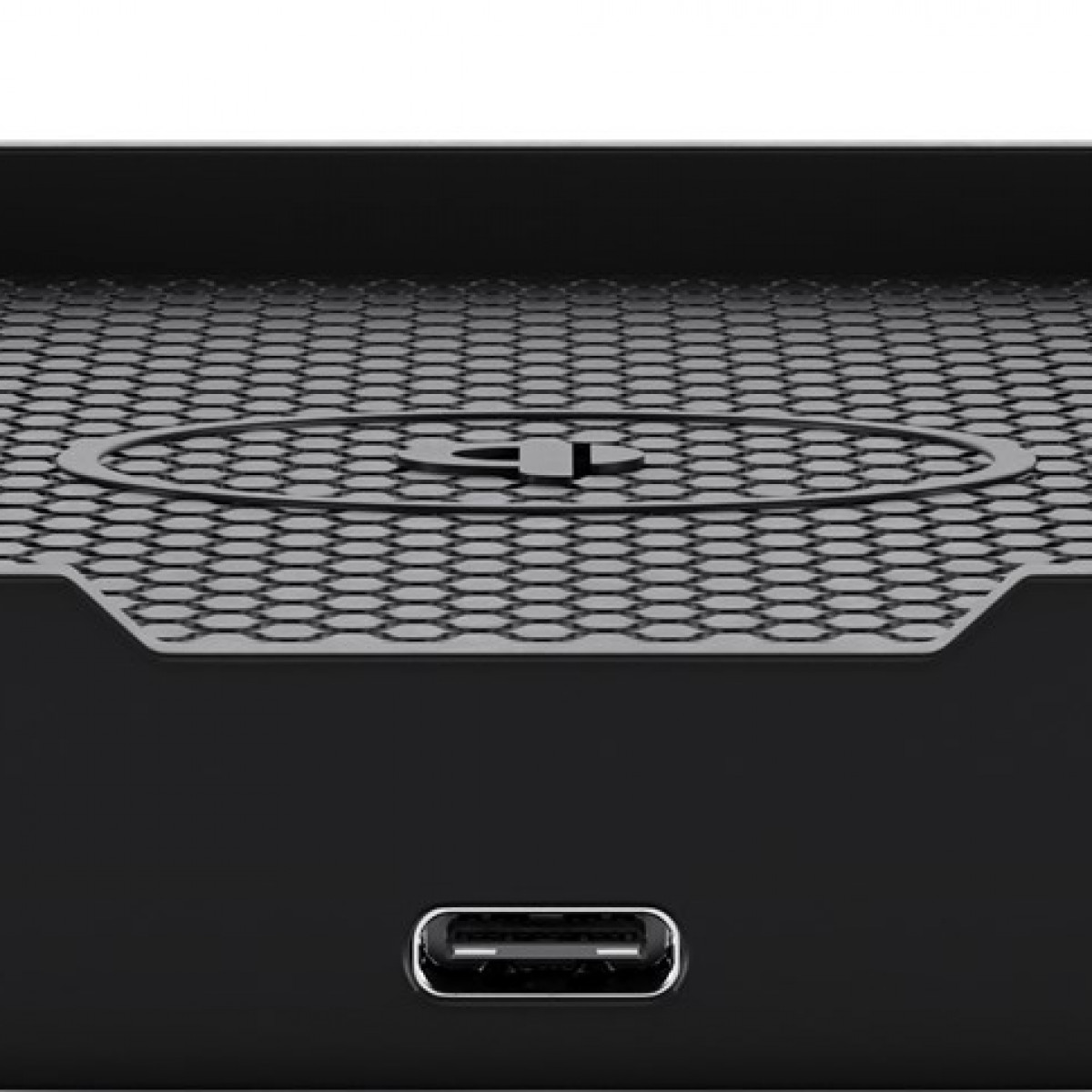 Ein schwarzes kabelloses Ladepad mit Wabenmuster. Ein USB-C-Anschluss ist sichtbar.