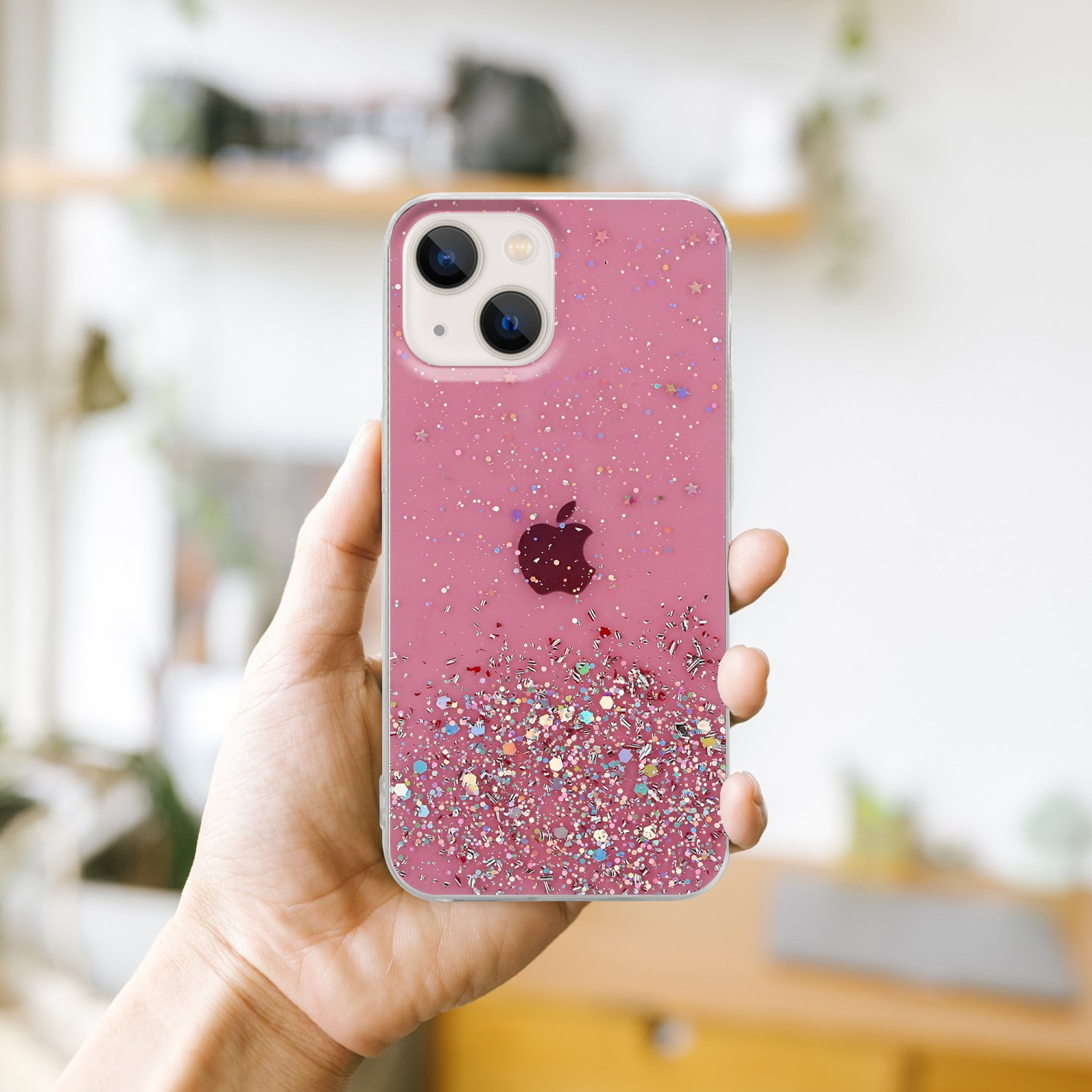 Rosa Handyhülle mit Glitzer und einem Telefon darin. Das Telefon hat ein Apple-Logo.