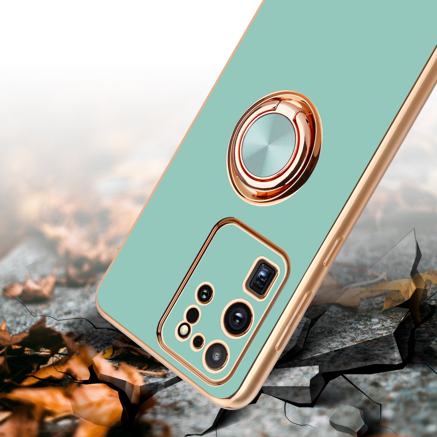 Custodia per telefono verde menta con finiture dorate e anello. Primo piano della custodia.