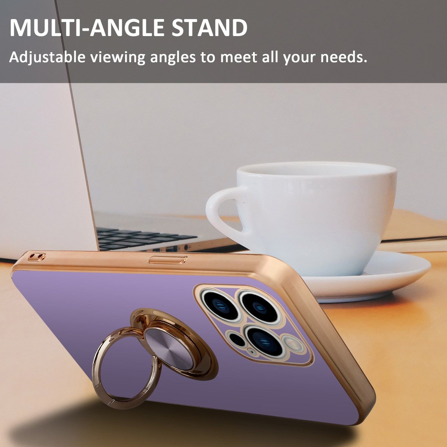 Ein Telefon in einer lila Hülle mit Ringständer, eine weiße Tasse und ein Laptop im Hintergrund.