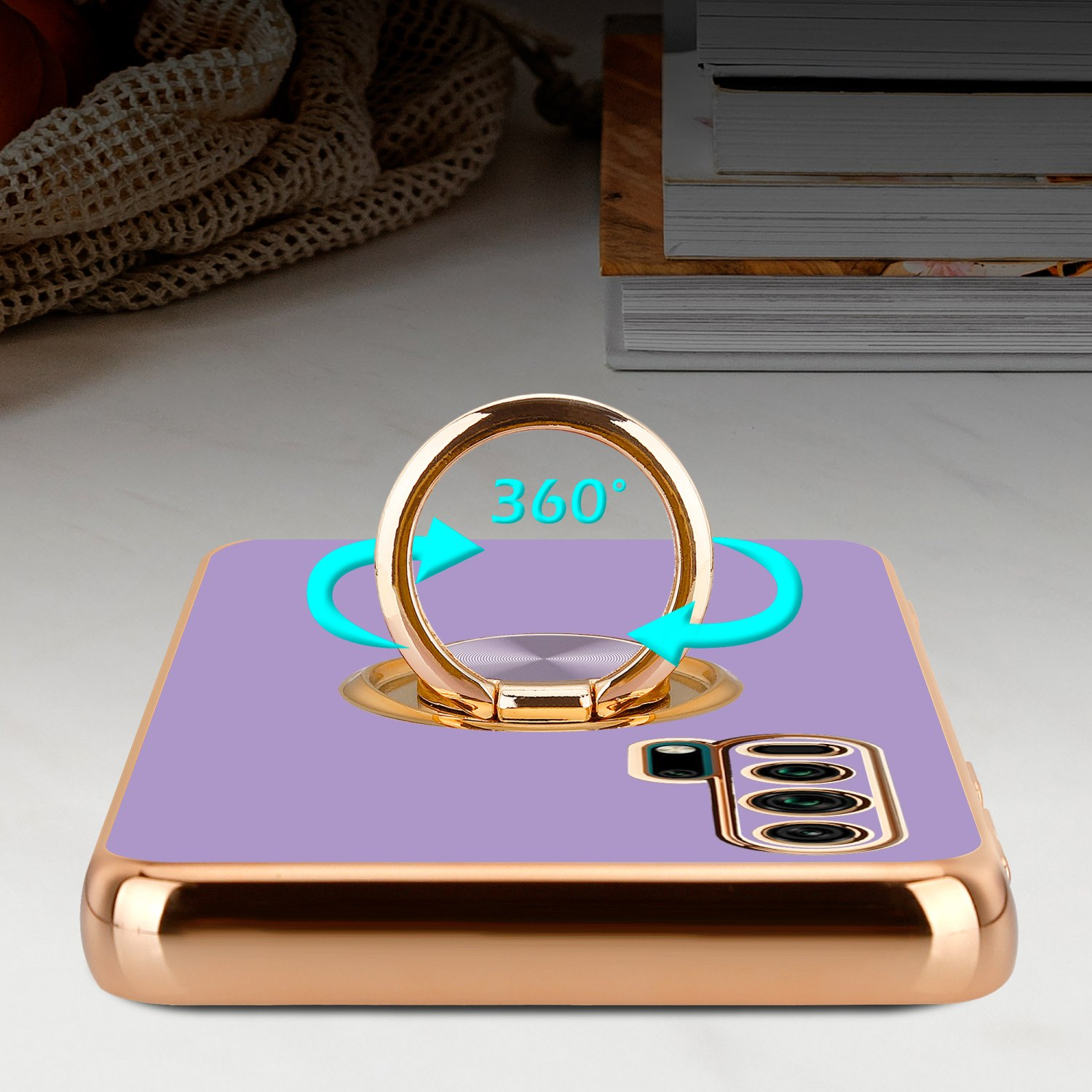 Lila Handyhülle mit goldenem Ringhalter, 360-Grad-Drehung. Goldener Rahmen.