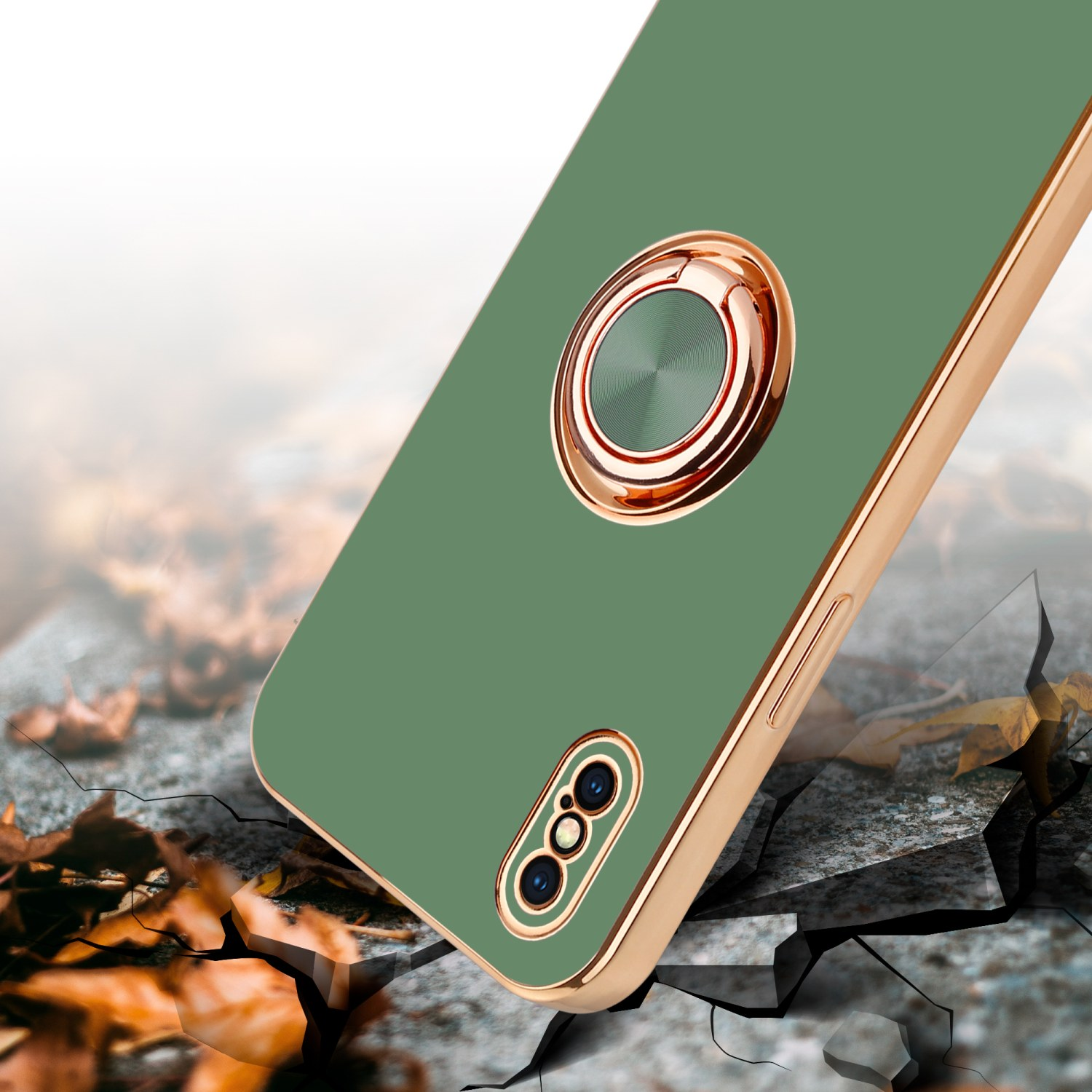 Grüne Handyhülle mit goldenem Ring und Kamera. Abstrakter Hintergrund mit Rissen.