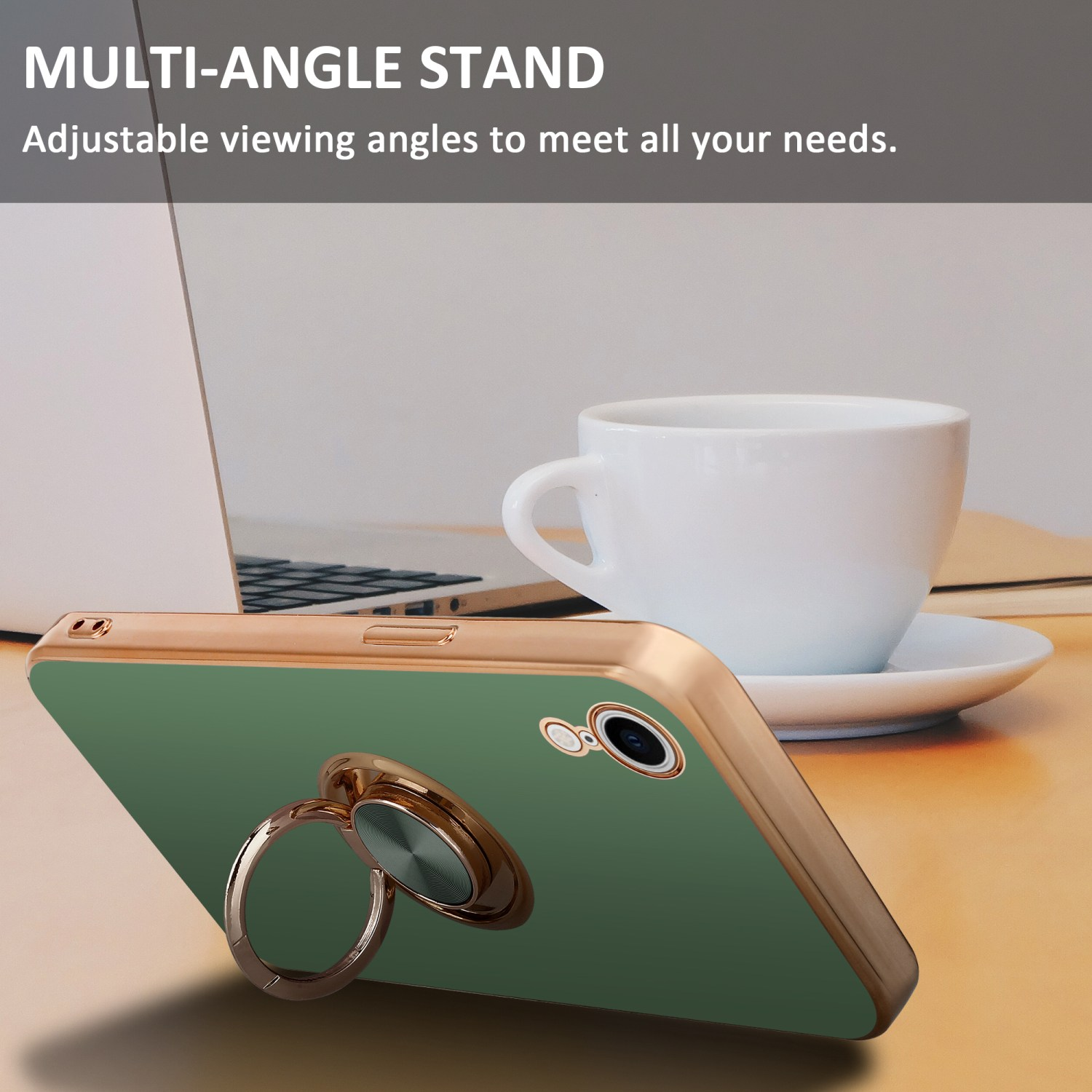 Handyhülle mit Ringständer, grün und gold, auf einem Tisch mit einer Kaffeetasse und einem Laptop.