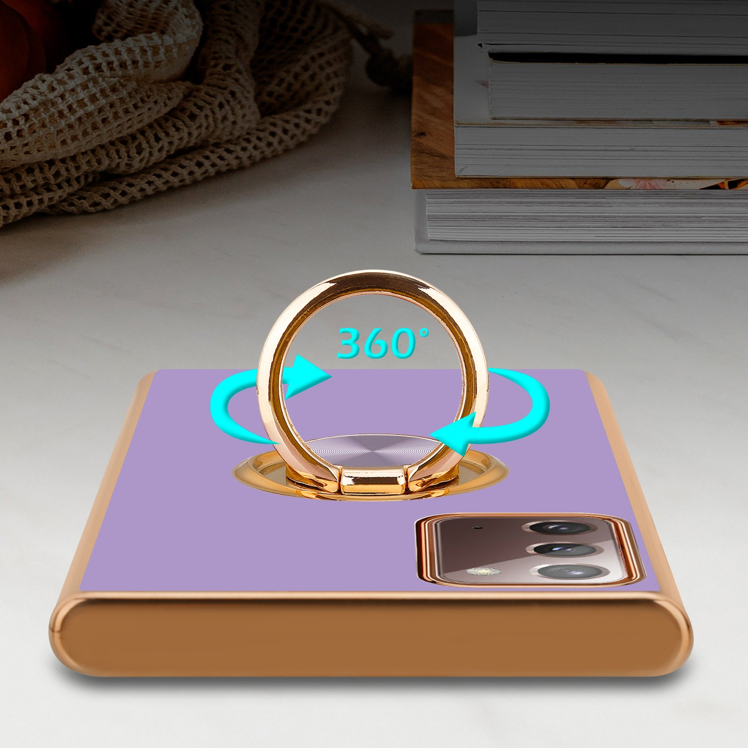 Custodia viola con anello dorato. Le frecce indicano che l'anello ruota di 360 gradi.