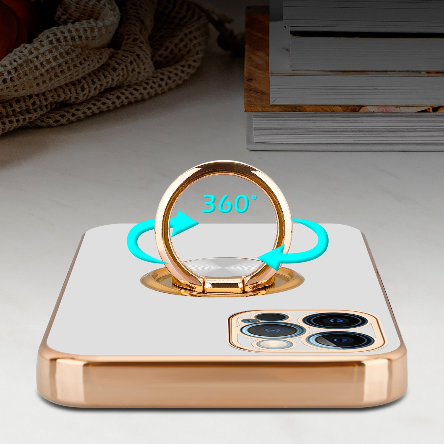 Handyhülle mit goldenem Ring. Der Ring dreht sich. Telefon auf weißer Oberfläche. Blaue Pfeile.