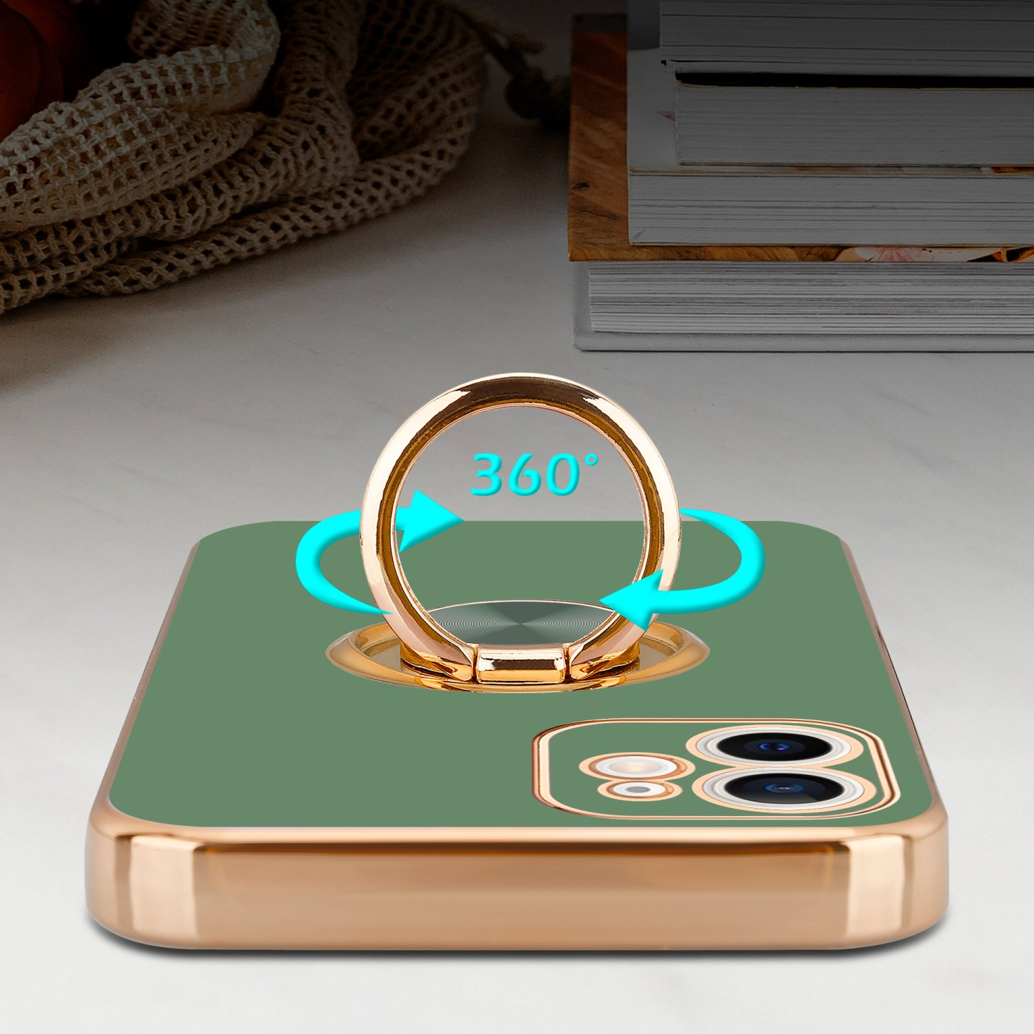 Eine Handyhülle mit goldenem Ringhalter. Der Ring zeigt Pfeile, die sich um 360 Grad drehen.