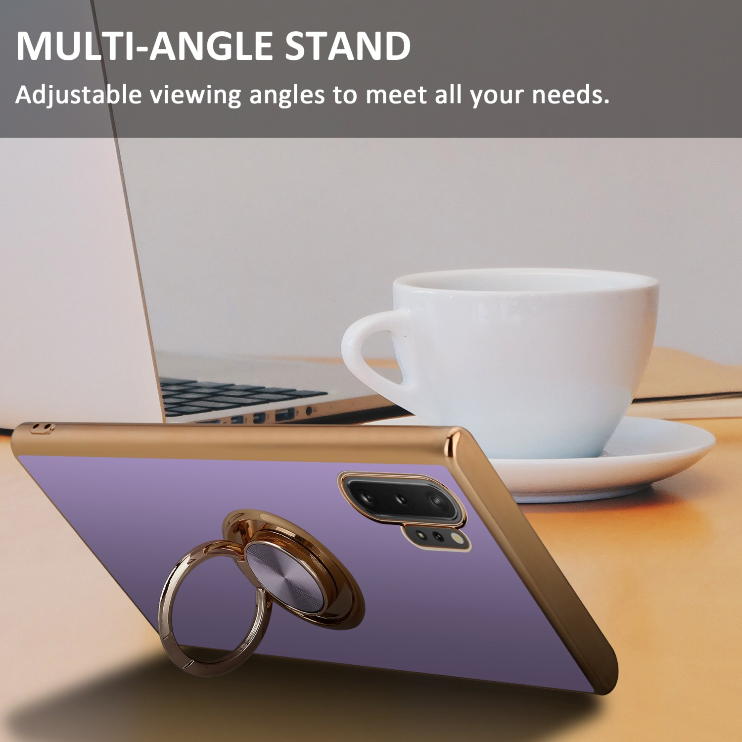 Telefon mit goldenem Ringständer auf einem Schreibtisch. Weiße Tasse und Laptop im Hintergrund.