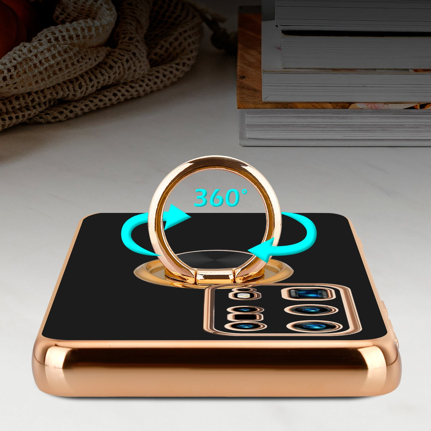 Schwarze Handyhülle mit goldenem Ring, 360°-Pfeilen.