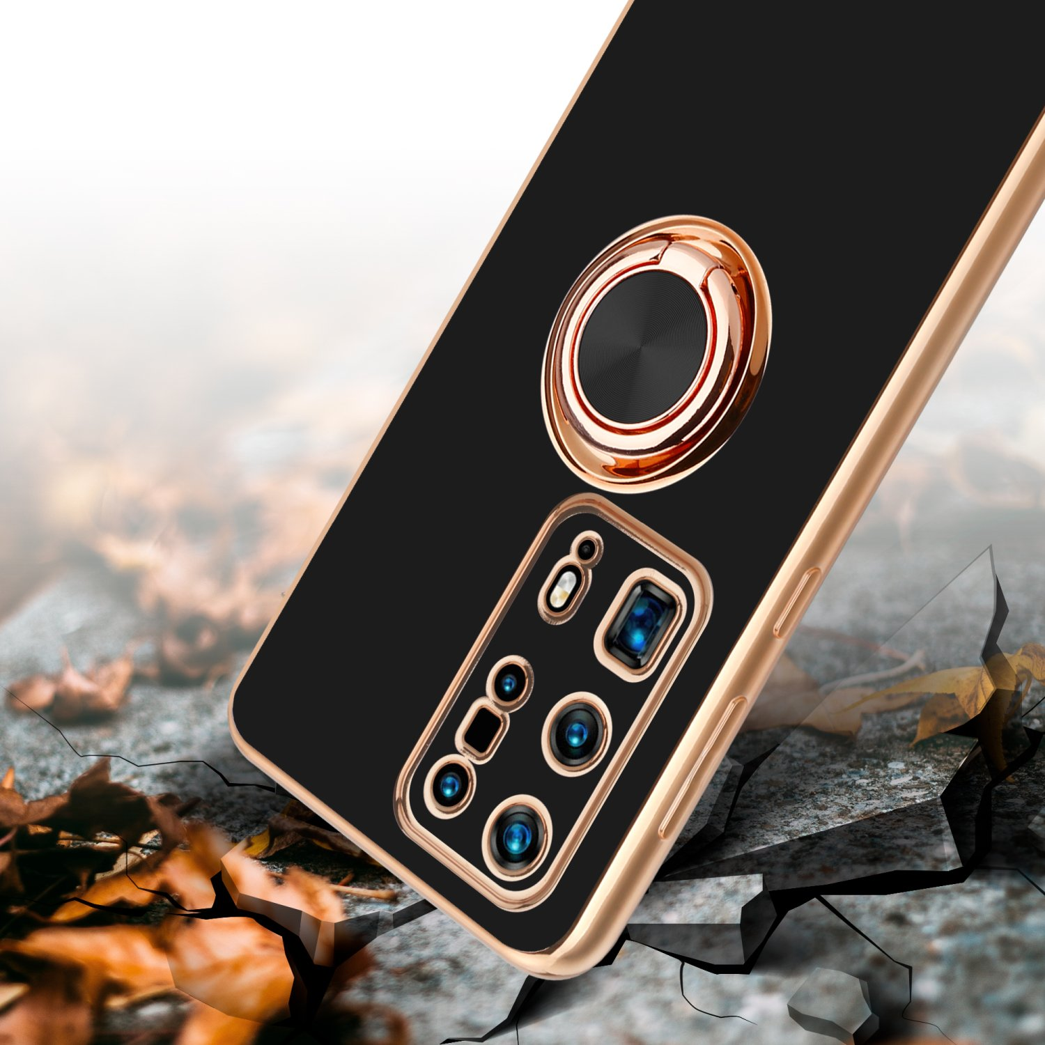 Goldene Handyhülle mit Ringhalter, Telefon mit schwarzem Bildschirm. Rissiger Boden.