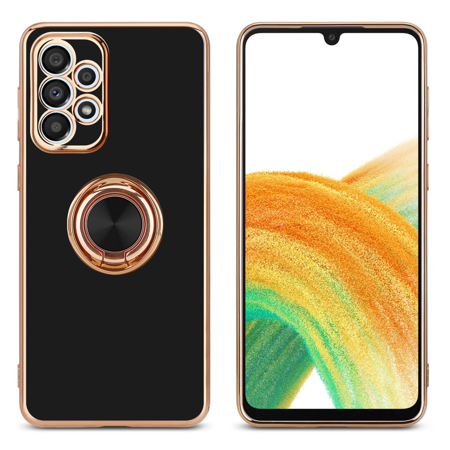 Una custodia per telefono nera e un telefono. Entrambi hanno un supporto ad anello. Il telefono ha una cornice dorata.