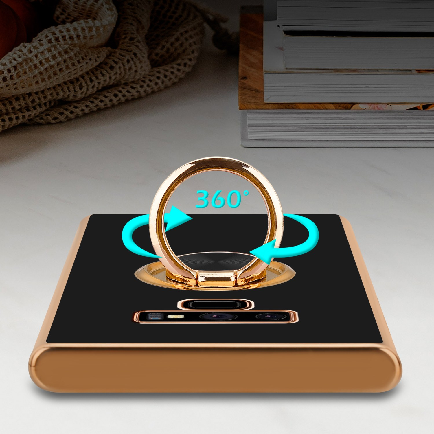 Custodia per telefono con anello di supporto, colore oro con retro nero.