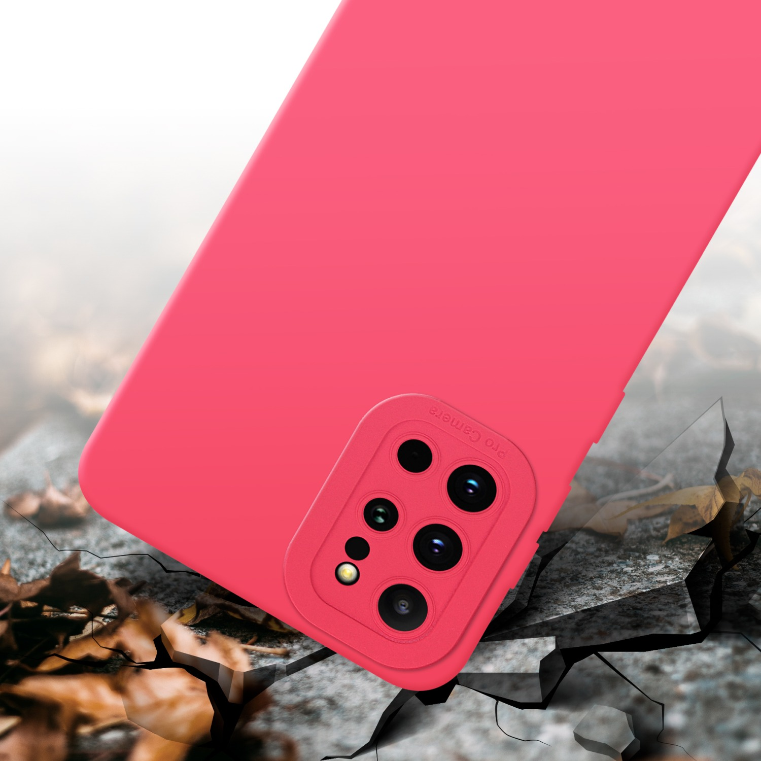 Pinke Handyhülle mit Kameraerhöhung, liegt auf rauer Oberfläche.