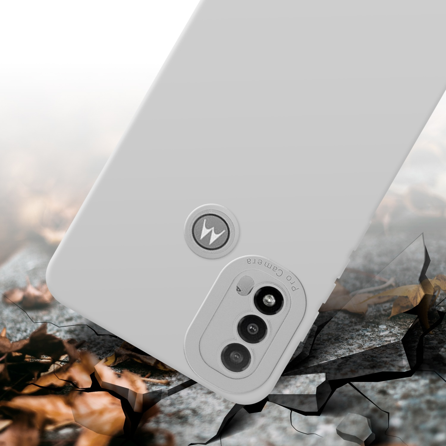 Custodia grigia con logo Motorola. Il telefono è appoggiato su una superficie crepata.