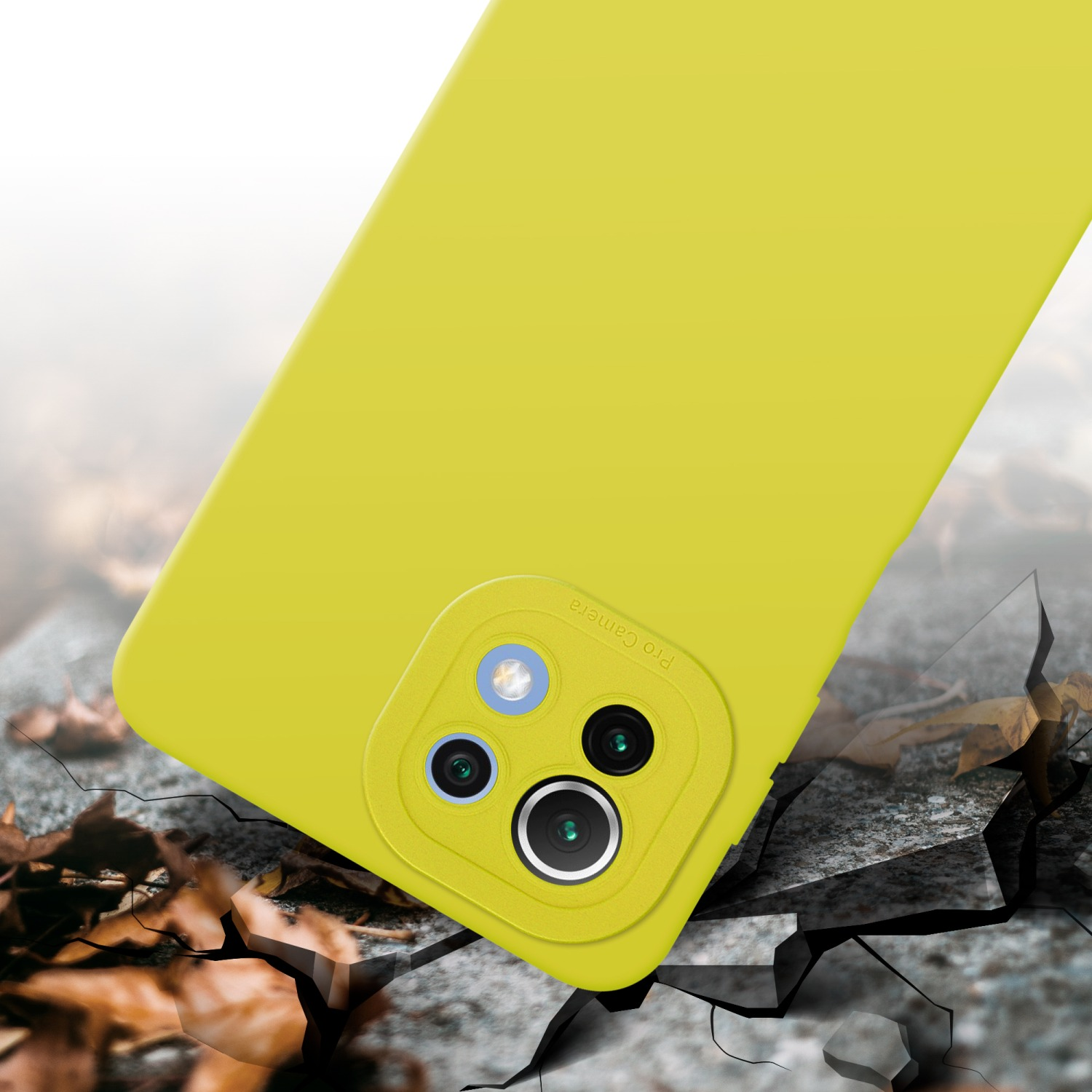Custodia gialla per telefono con lenti della fotocamera. La custodia è su una superficie incrinata.