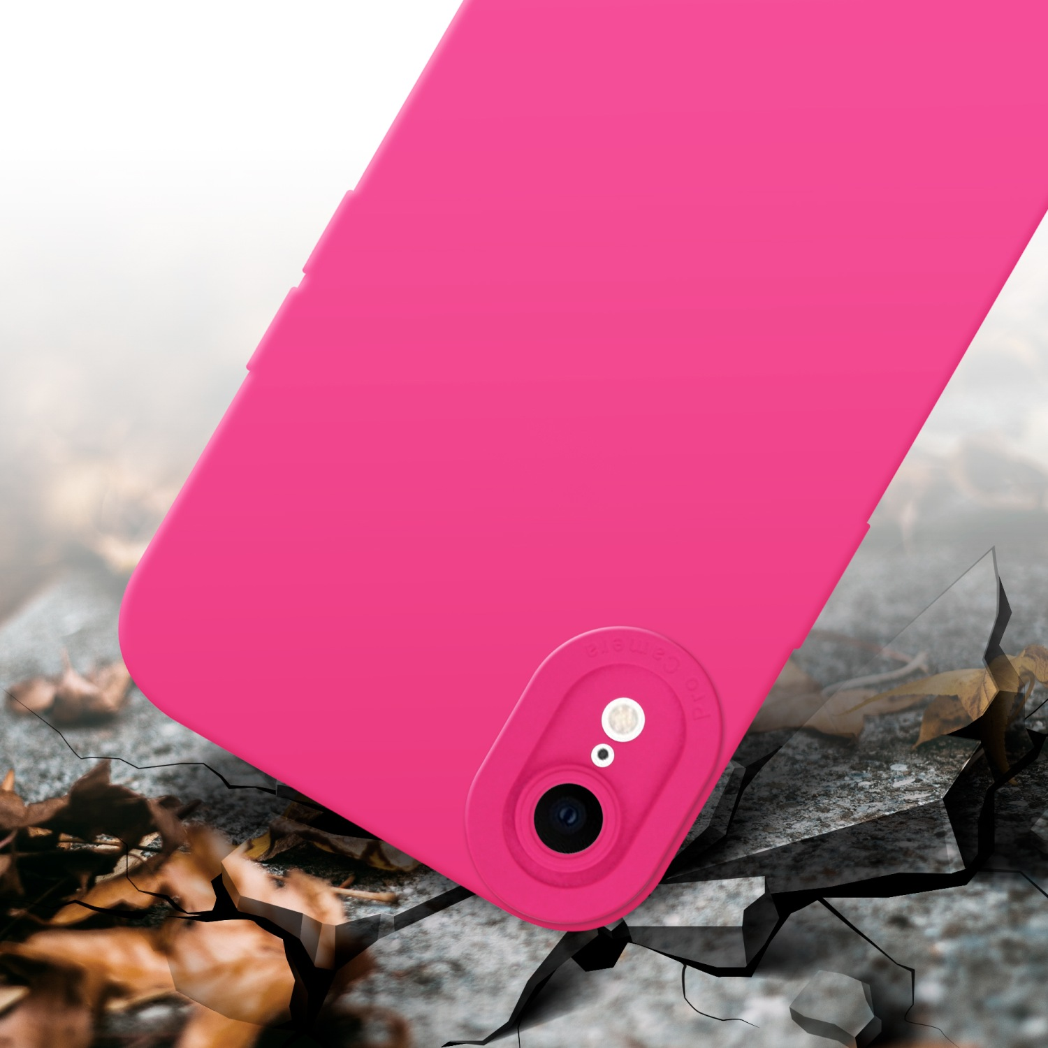 Una custodia rosa posizionata su una superficie incrinata.