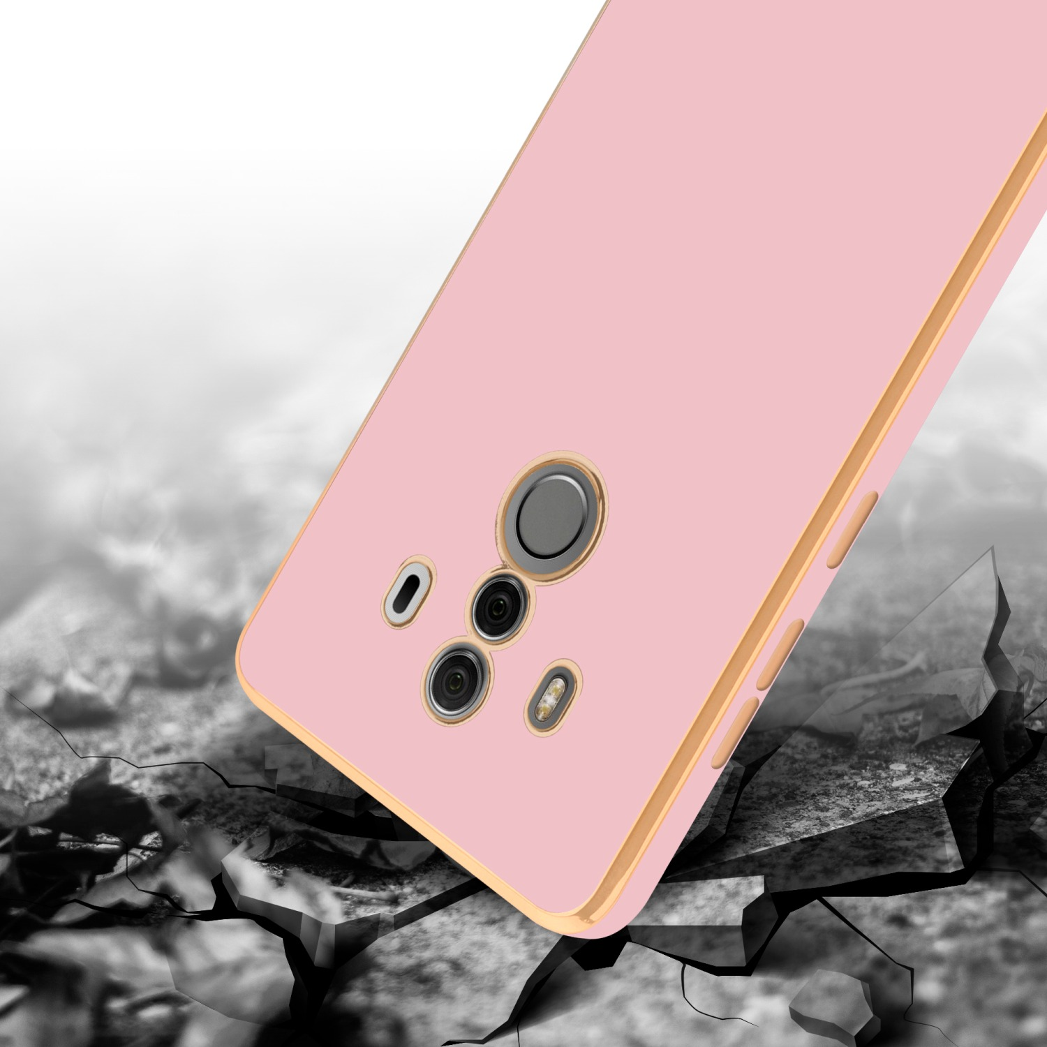 Telefon mit rosa Hülle, goldenem Rahmen, zerbrochener Boden im Vordergrund.