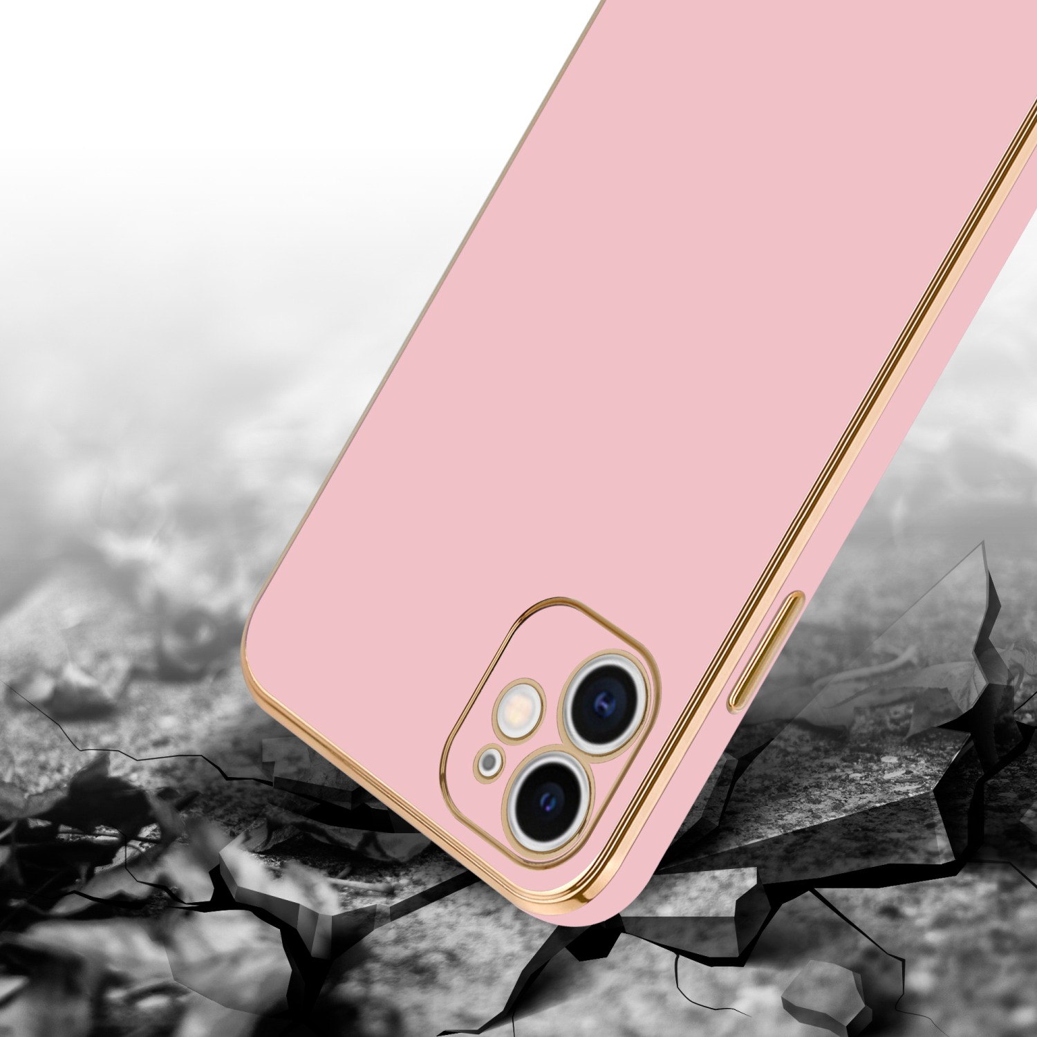 Pinkfarbene Handyhülle mit Beschädigung am Boden. Die Hülle hat eine Kameraabdeckung. Weißer Hintergrund.