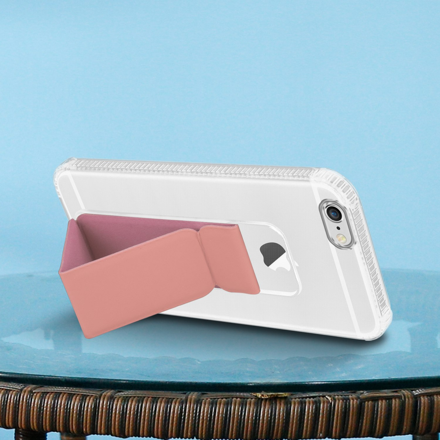 Ein Telefon auf einem Ständer, mit rosa Stütze.