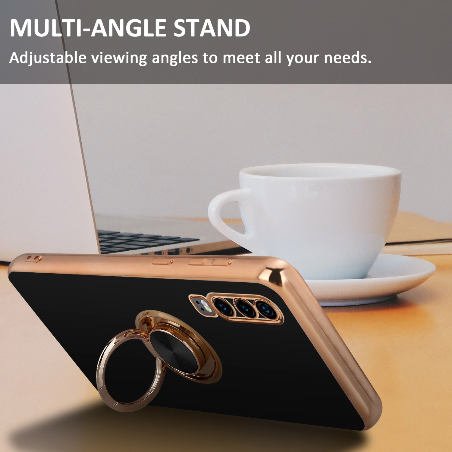 Schwarzes Telefon mit Ringständer, das auf einem Tisch in der Nähe einer Tasse und eines Laptops liegt.