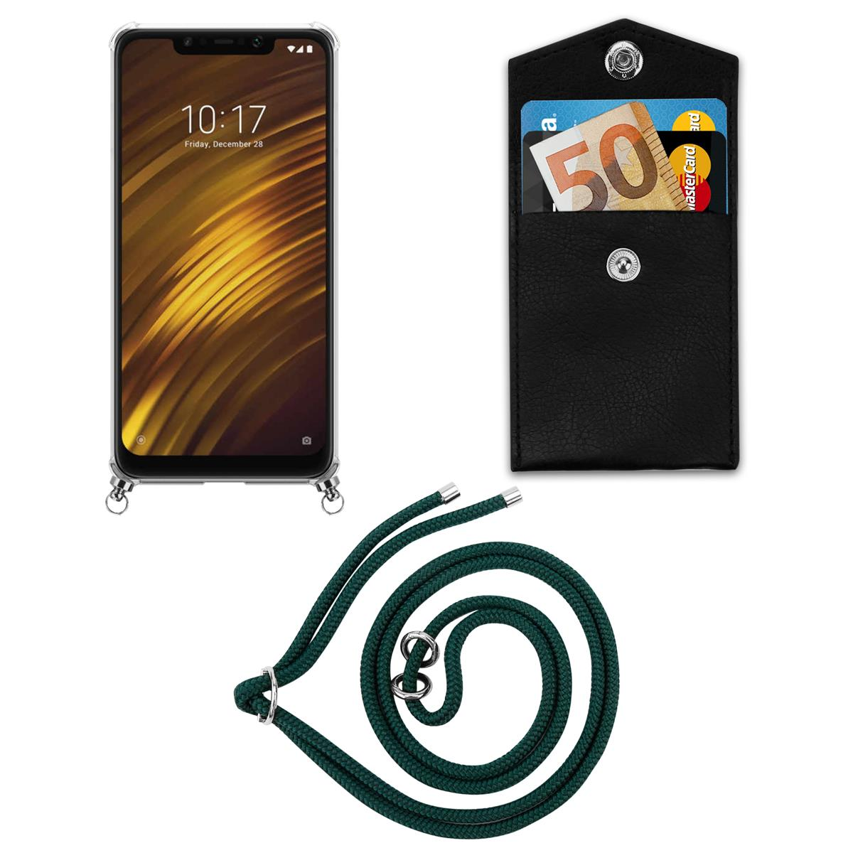 Ein Telefon mit Hülle und grünem Seilriemen, neben einer schwarzen Geldbörse mit Karten. Weißer Hintergrund.