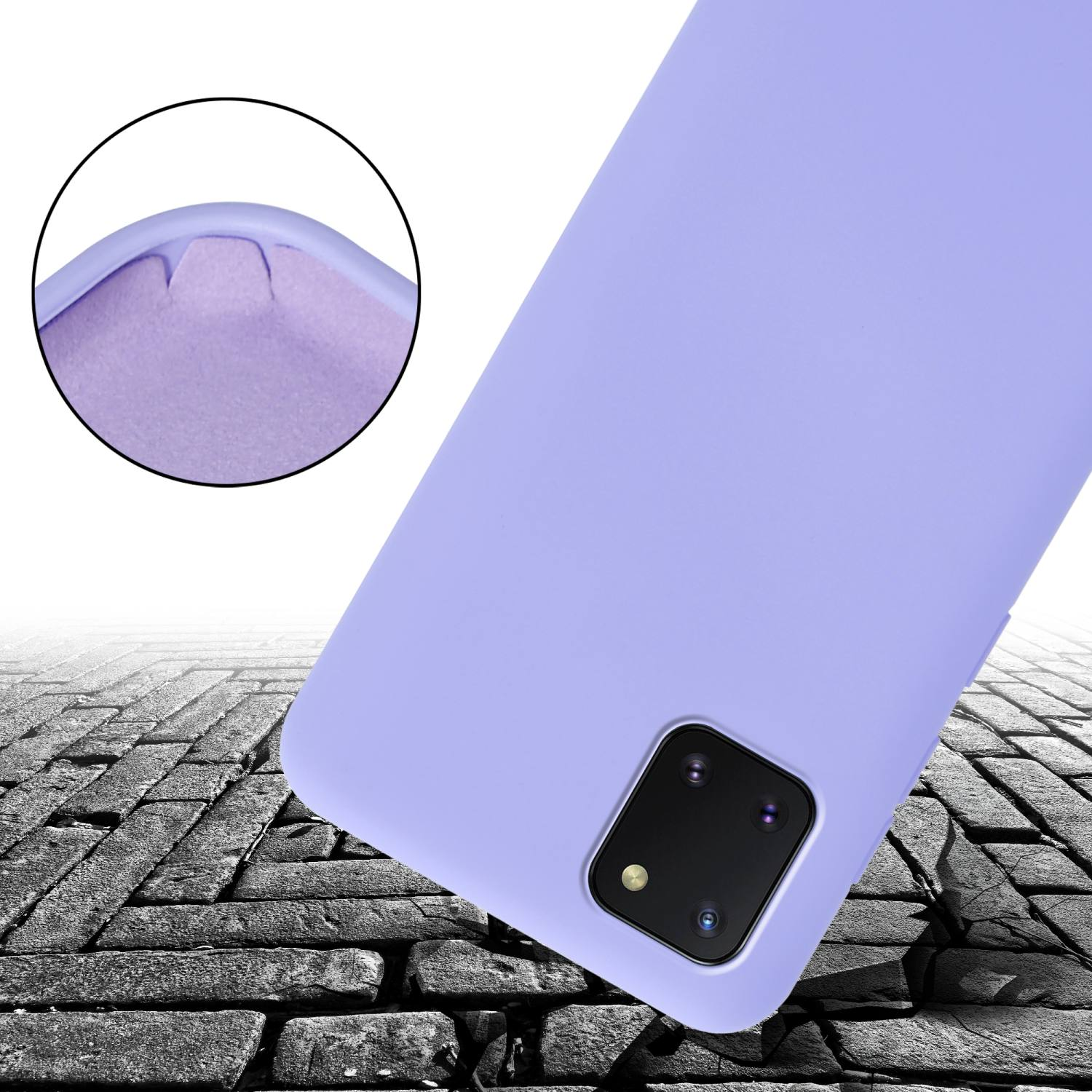 Lila Handyhülle auf zerbrochenem Boden. Das Telefon hat zwei Kameras.