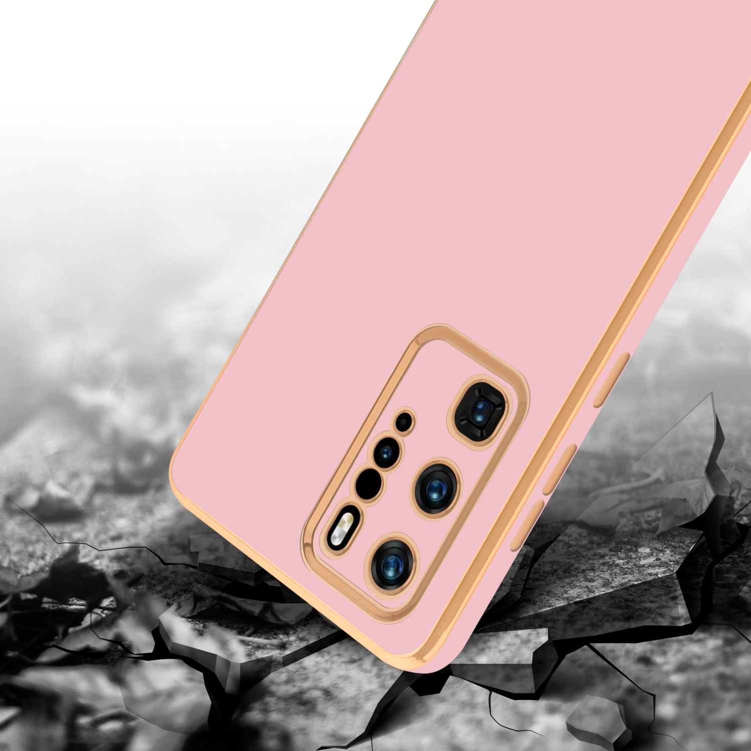 Eine pinkfarbene Handyhülle mit goldenem Rahmen auf einer zerbrochenen Oberfläche.