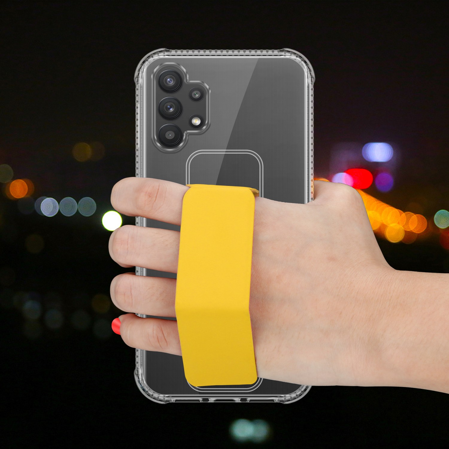 Hand, die ein Telefon mit gelber Riemenhülle hält, vor verschwommenem Hintergrund.
