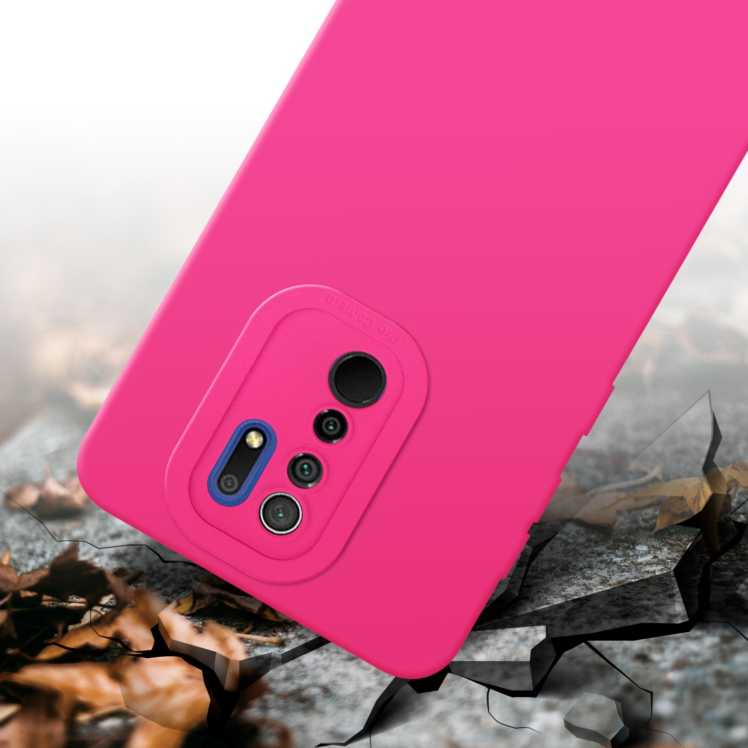 Custodia per telefono rosa su terreno crepato, con una fotocamera professionale.