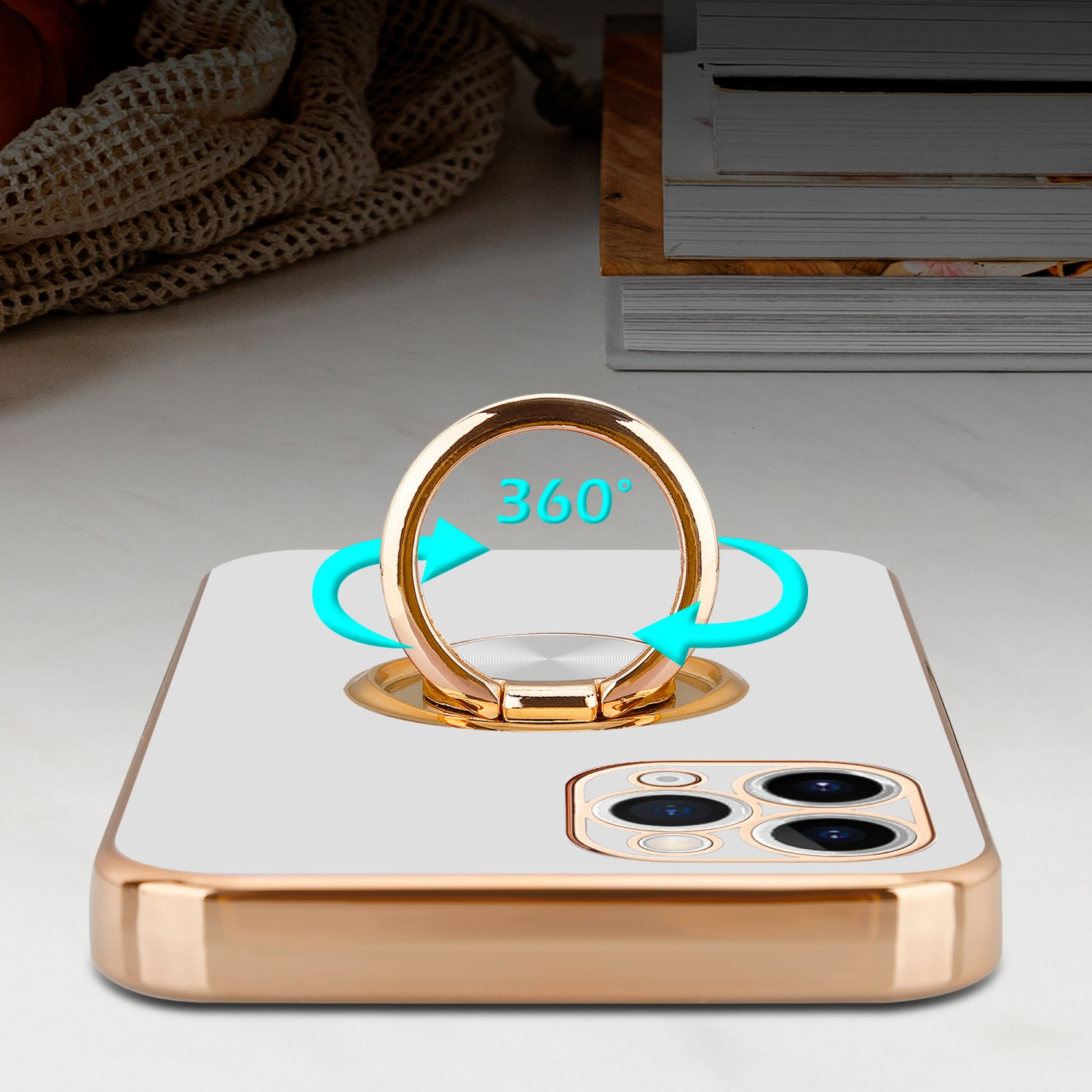 Handyhülle mit Ringhalter. Der Ring dreht sich um 360 Grad. Goldfarbe und weiße Rückseite.