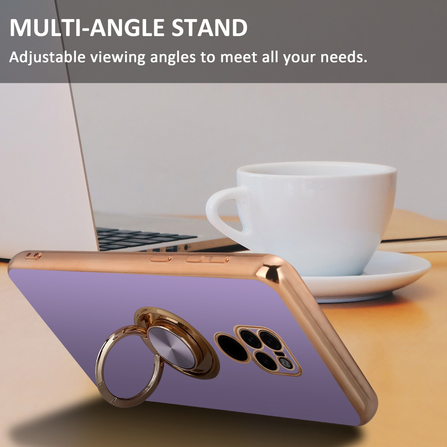 Lila Handyhülle mit goldenem Ringhalter auf einem Schreibtisch mit Tasse und Laptop.