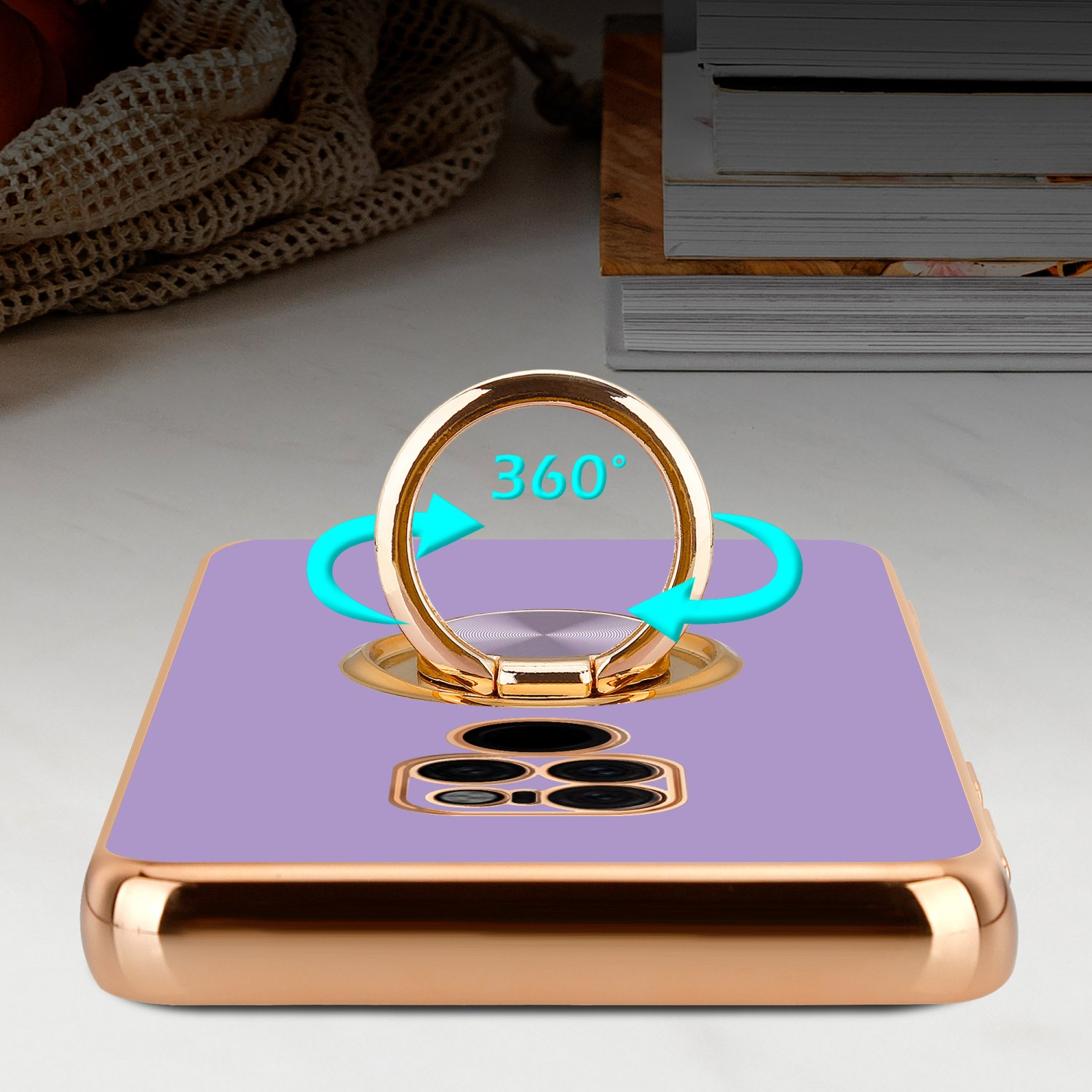 Lila Handyhülle mit goldenem Ringständer. Cyanfarbene Pfeile mit 360-Grad-Text.