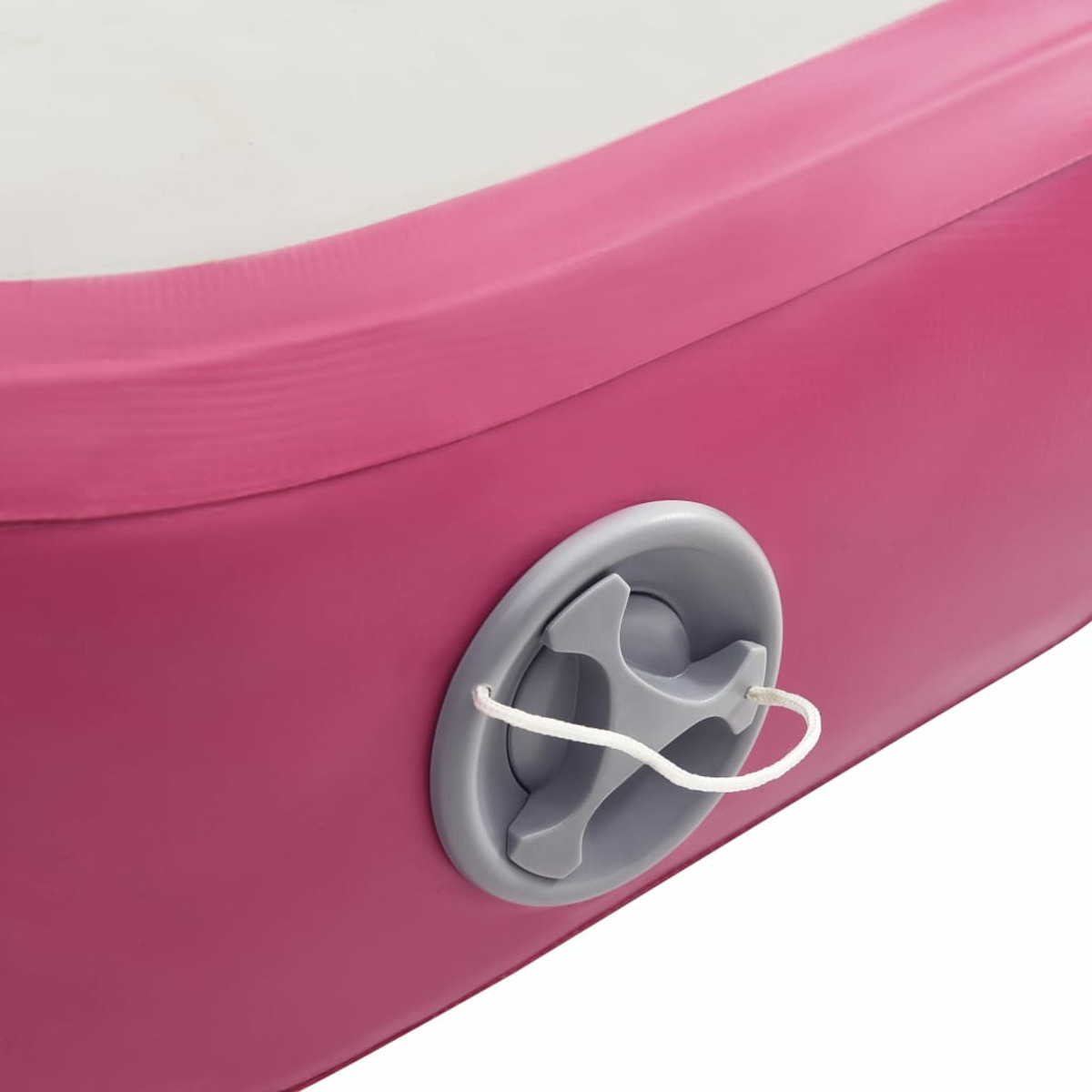 Primo piano di una superficie gonfiabile rosa con valvola grigia e corda bianca.