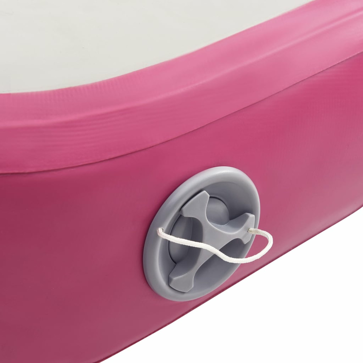 Primo piano di una valvola di materassino gonfiabile in rosa. Valvola grigia con corda bianca.