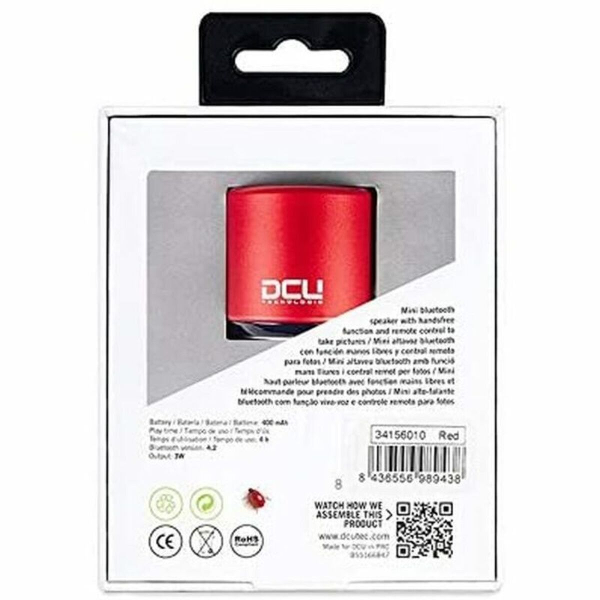 Pequeño altavoz rojo DCU Technologies en una caja blanca, con detalles del producto impresos detrás.