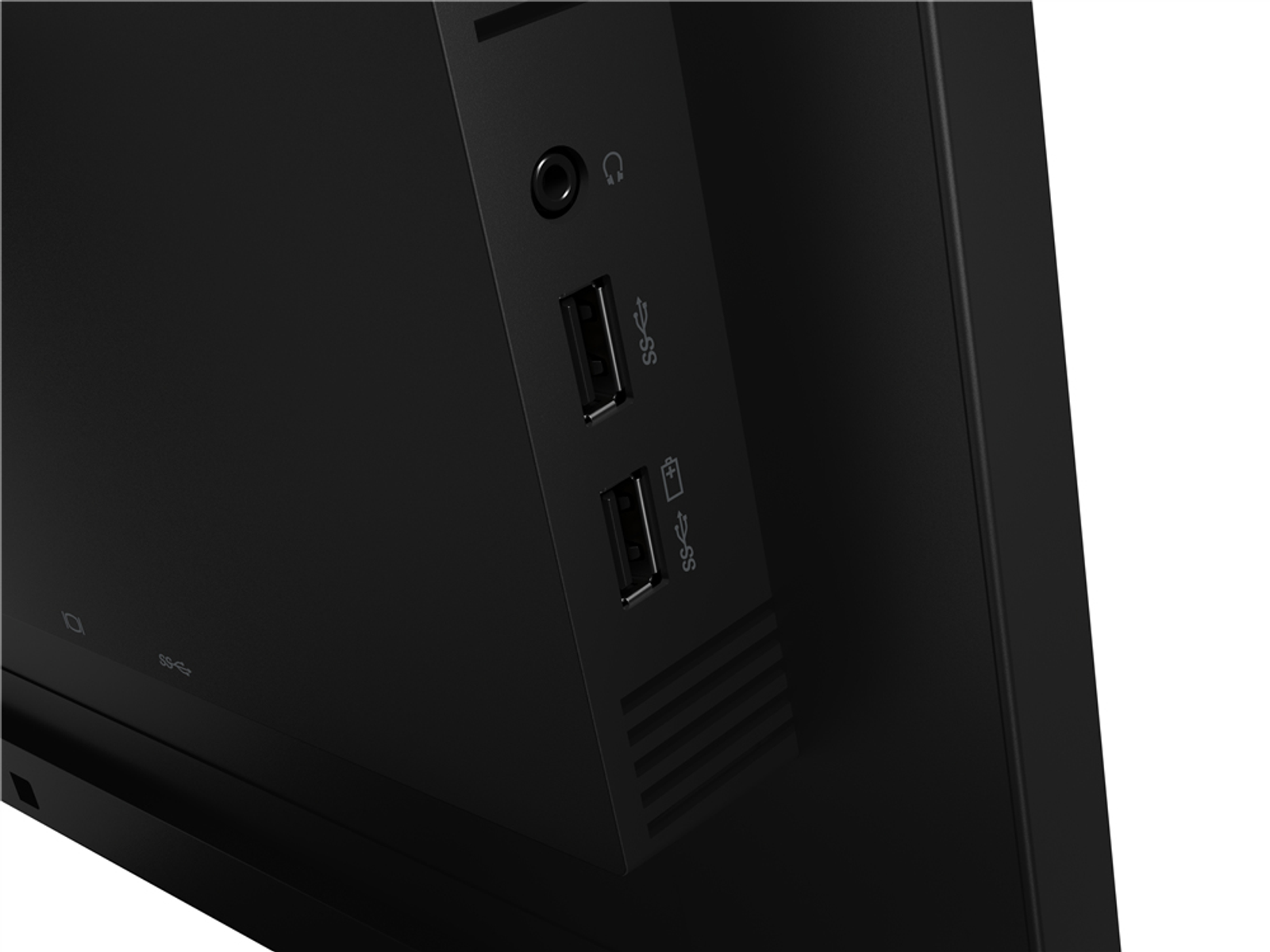 Primer plano de un monitor negro con dos puertos USB y una toma de auriculares.