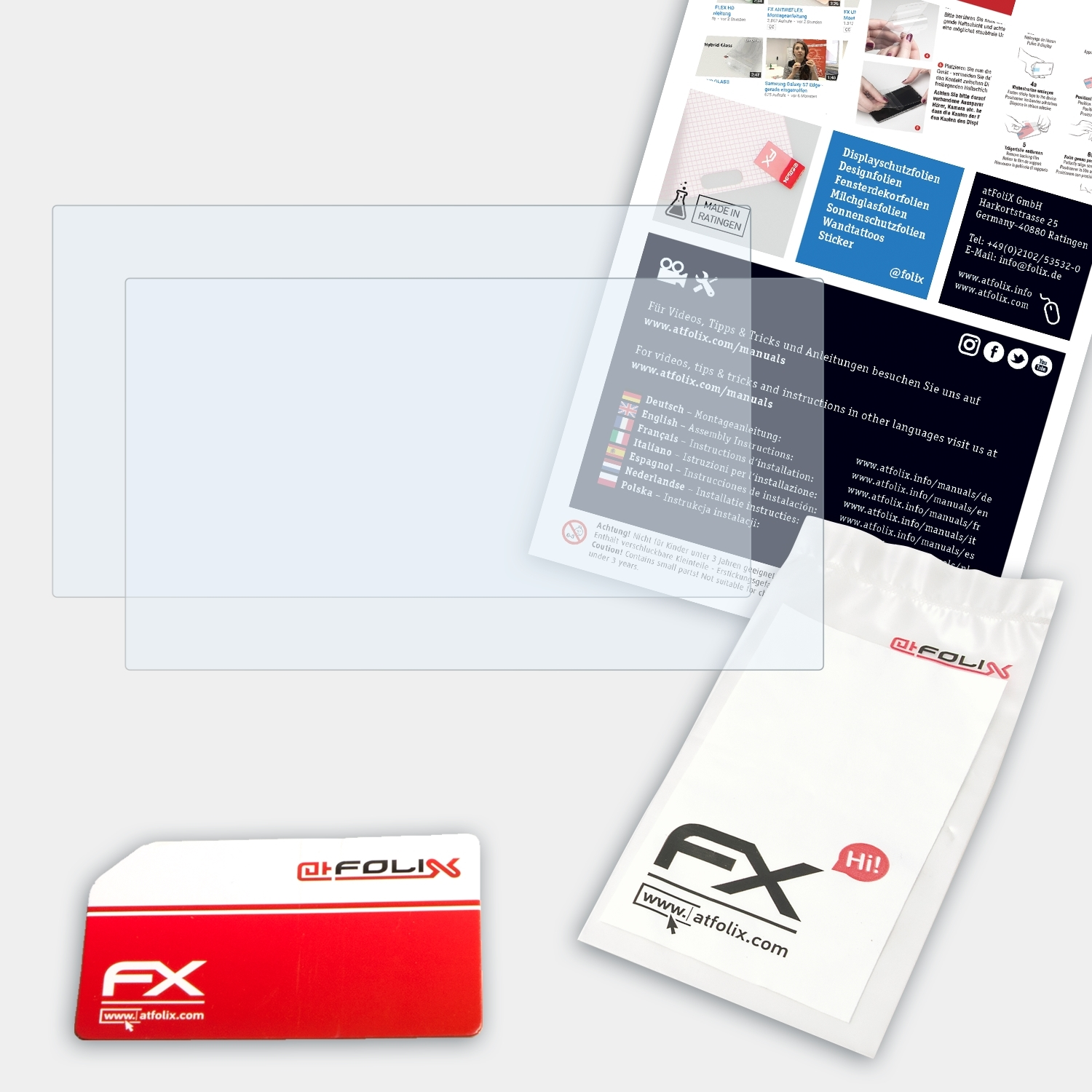 Ein transparenter Displayschutz, eine Karte im Kreditkartenformat und eine Broschüre sind auf weißer Oberfläche zu sehen.