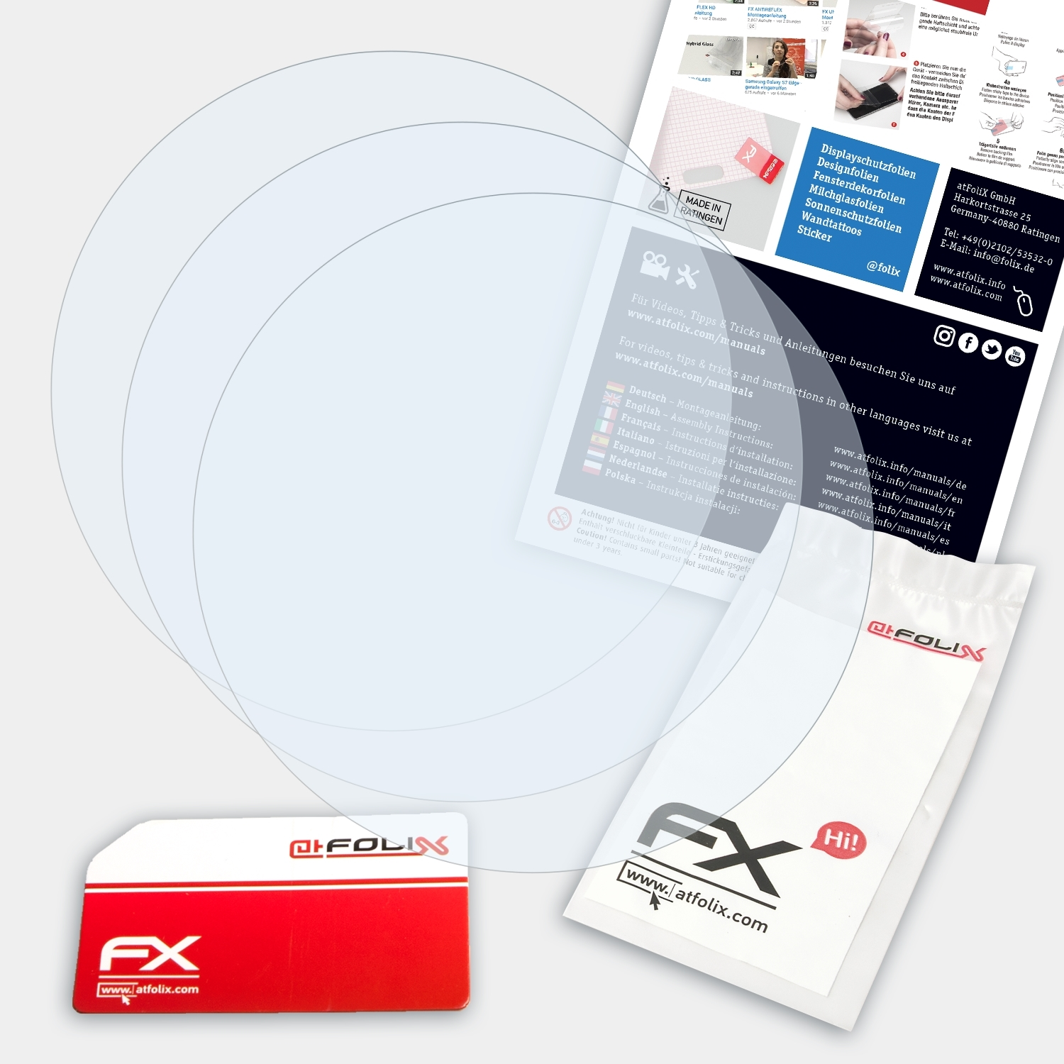 Displayschutzfolien, eine Karte und eine Packung auf weißem Untergrund. Eine Broschüre im Hintergrund.
