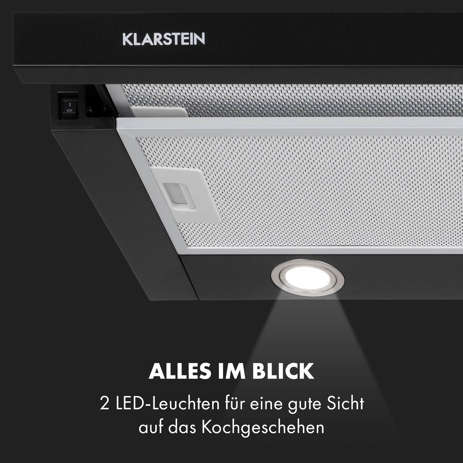 Primer plano de una campana extractora Klarstein negra con una luz que brilla sobre ella. Texto: Alles im Blick.