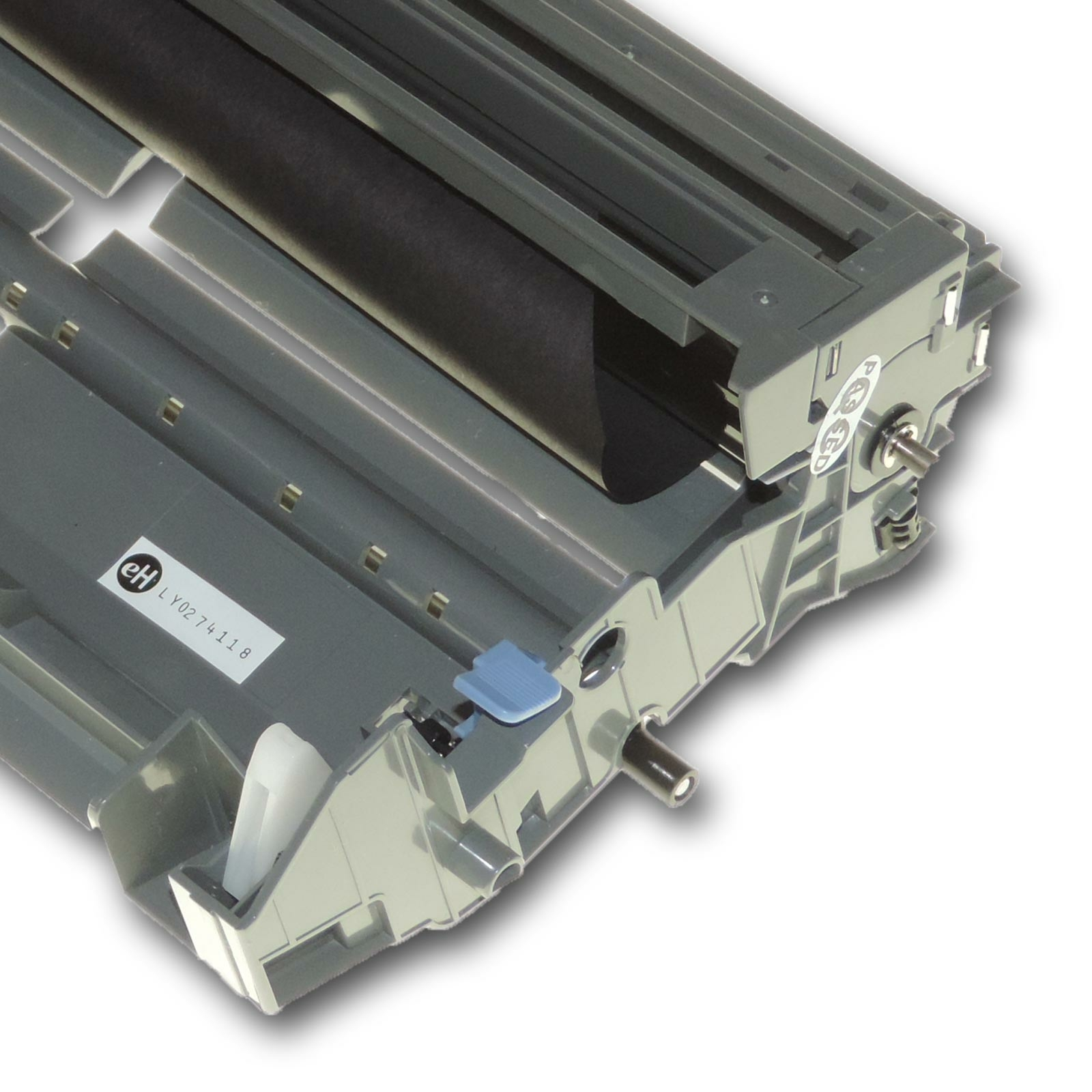 Graue Druckertrommel. Sie hat eine schwarze Walze und mehrere mechanische Teile. Die Trommel ist abgewinkelt.