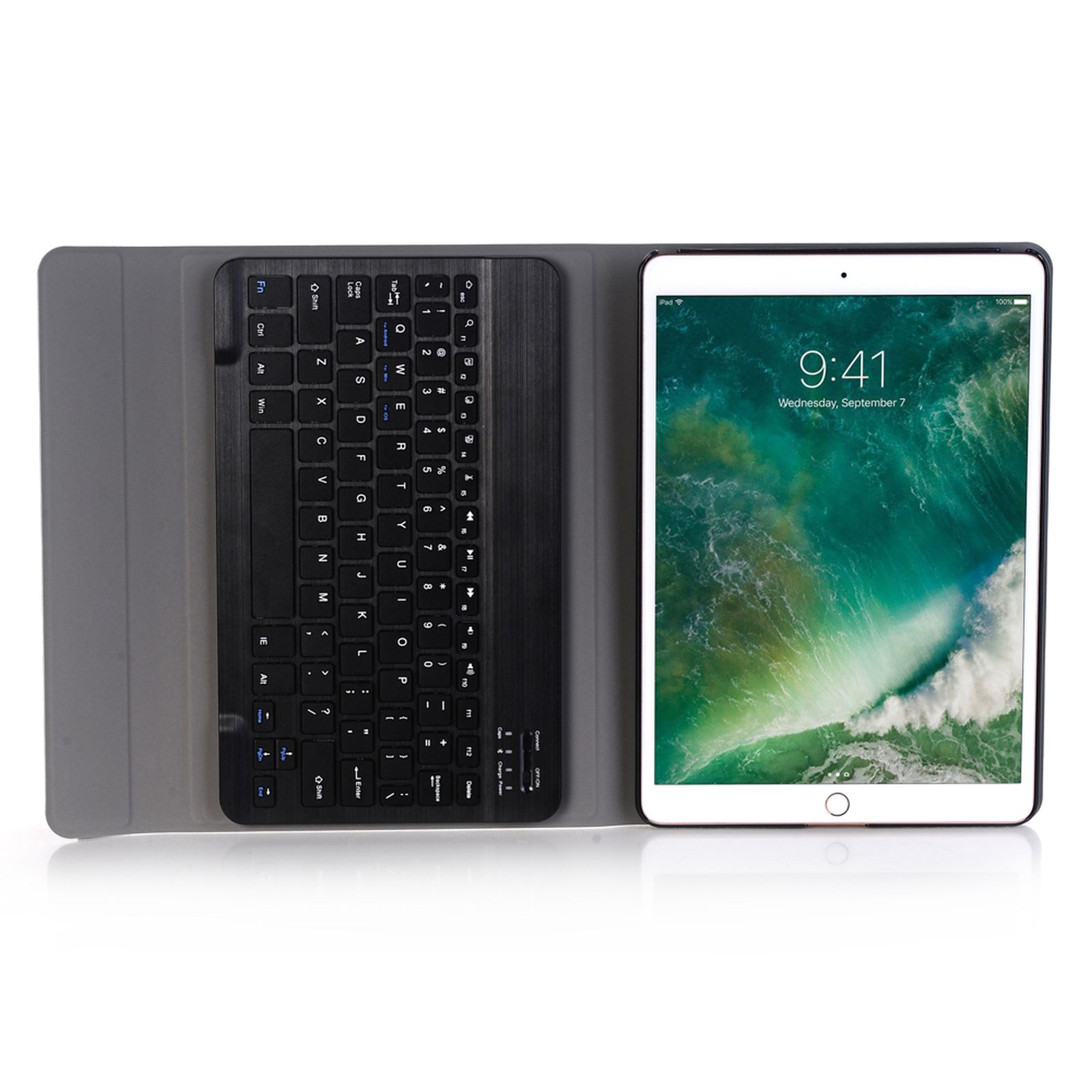Tablet- und Tastaturhülle. Das Tablet befindet sich rechts. Die Tastatur ist schwarz und links.