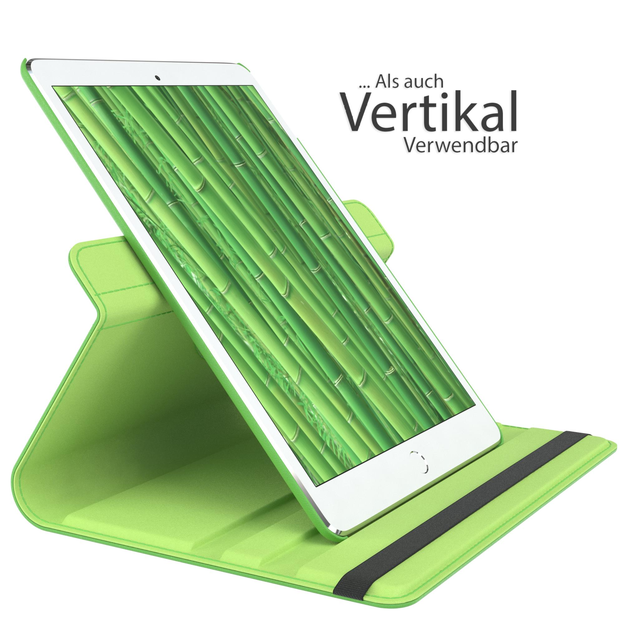 Grünes Tablet in einem Ständer mit Bambushintergrund, vertikale Nutzung vorgeschlagen.