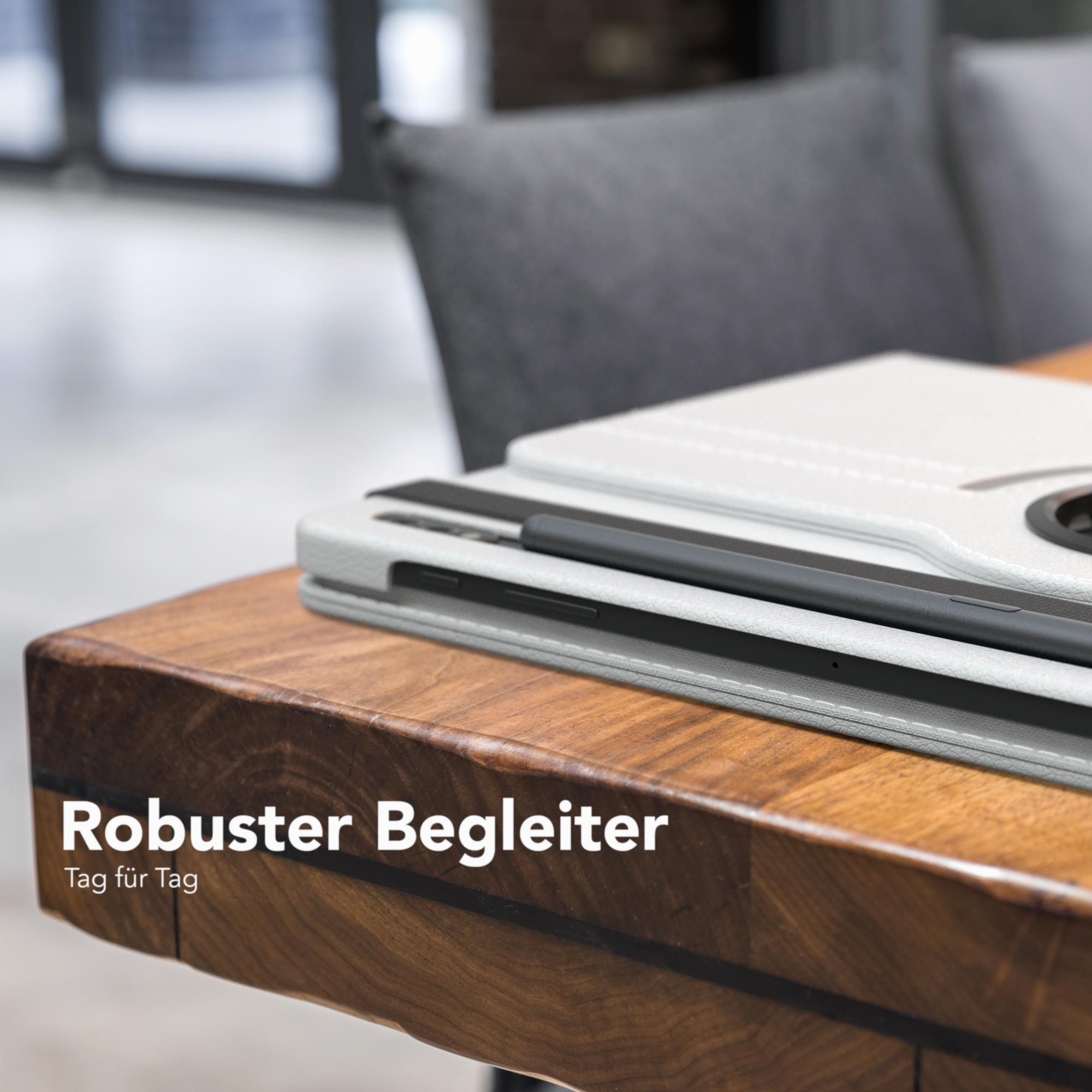 Tablet in weißer Hülle auf einem Holztisch. Text: Robuster Begleiter.