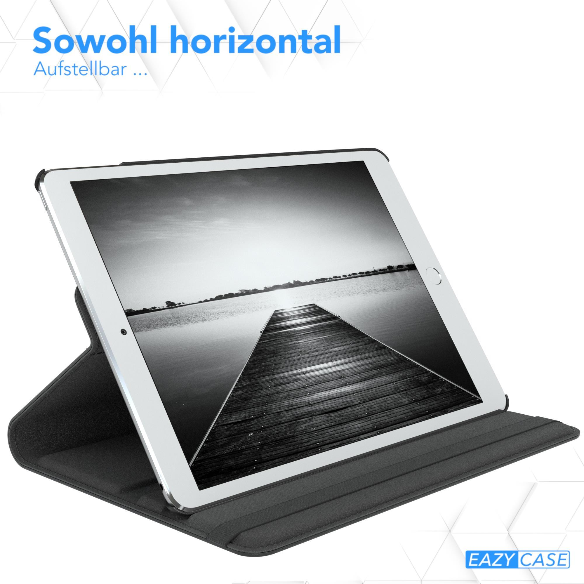 Tablet auf einem Ständer, zeigt ein monochromatisches Bild eines Piers ins Wasser.
