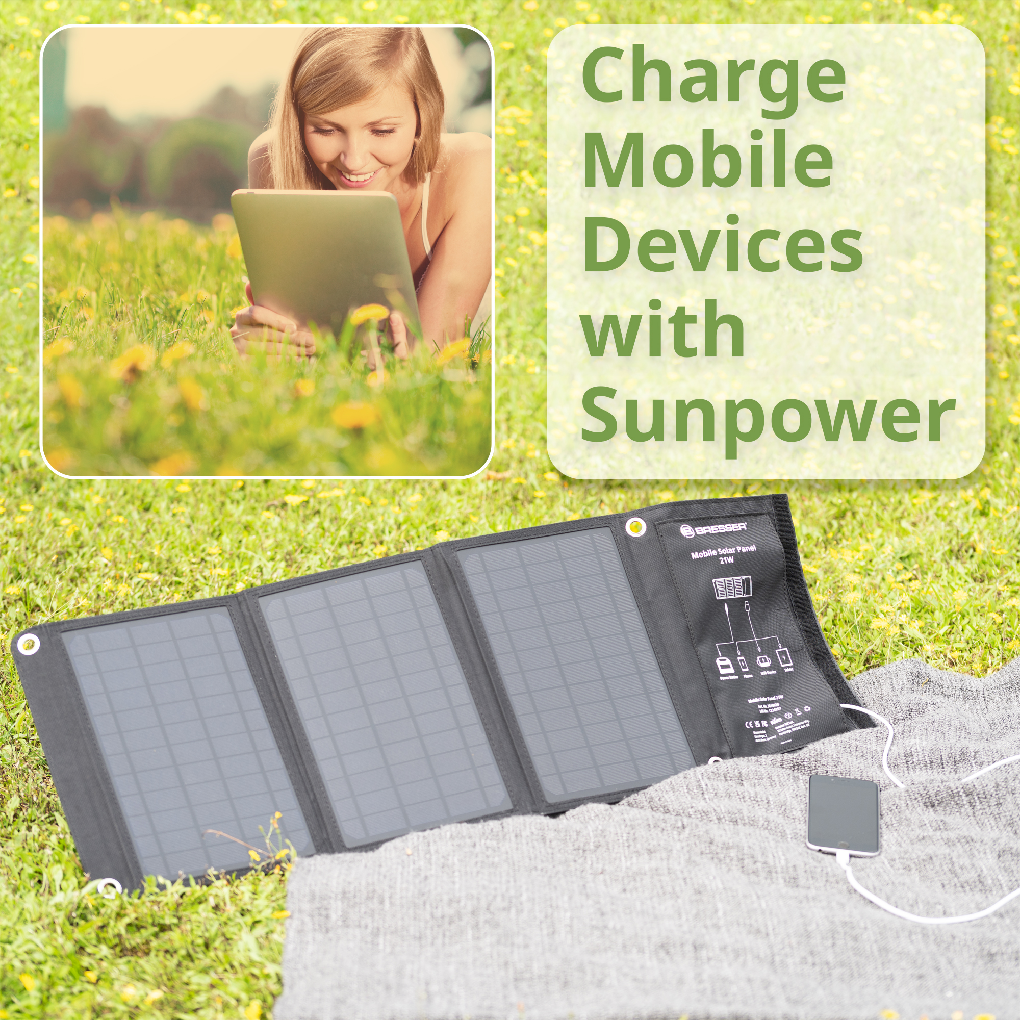 Frau benutzt Tablet auf Gras, neben Solarpanel, das Telefon lädt.