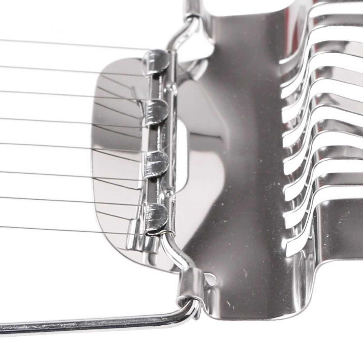 Stainless steel egg slicer with thin wires. White background.