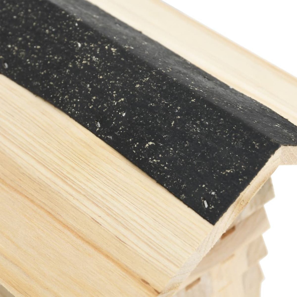 Nahaufnahme einer Holzkonstruktion mit einem schwarzen, strukturierten Streifen oben.