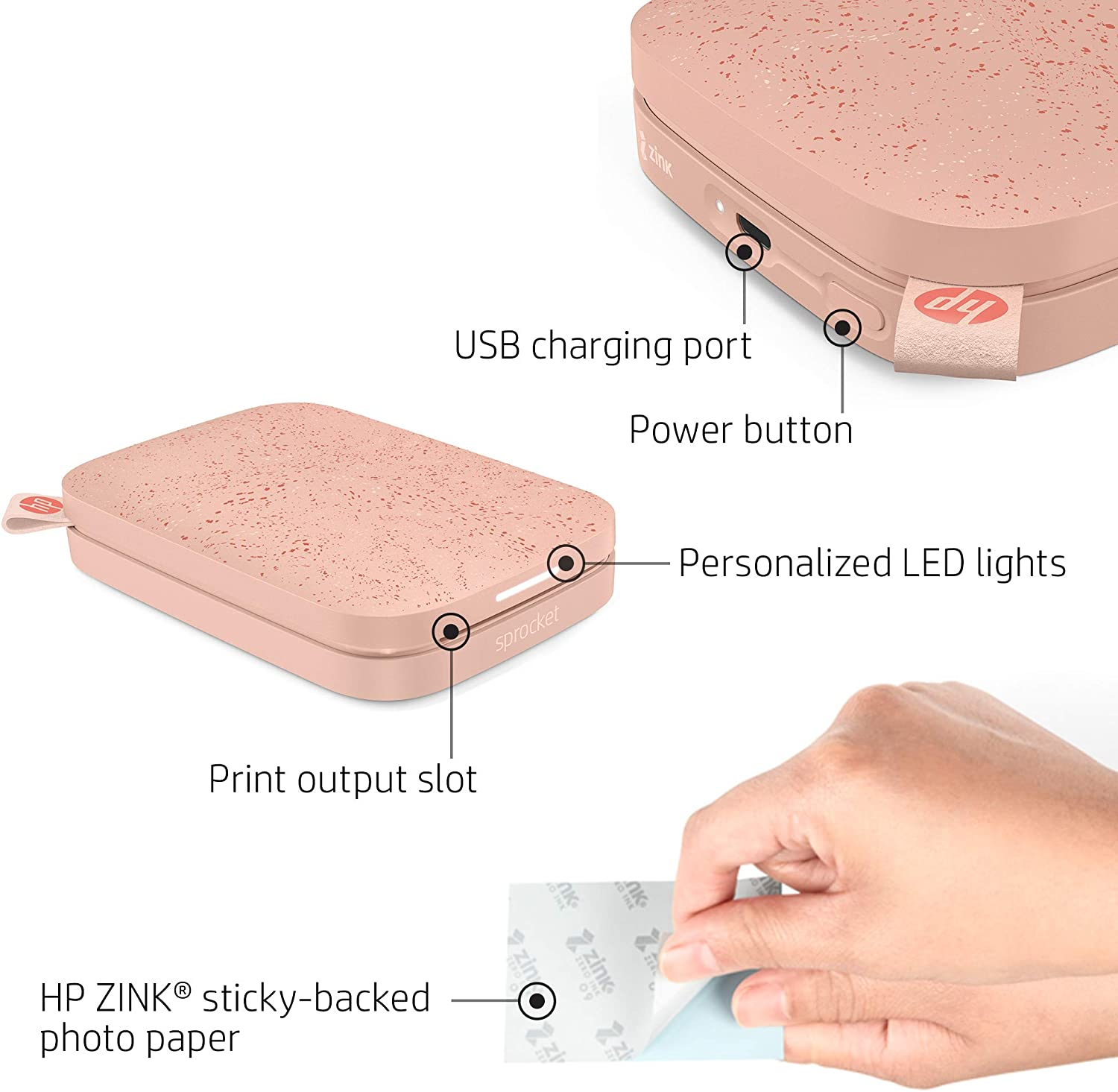 Różowa przenośna drukarka zdjęć ze szczegółami. Widoczny port ładowania USB, przycisk zasilania i spersonalizowane światła LED.