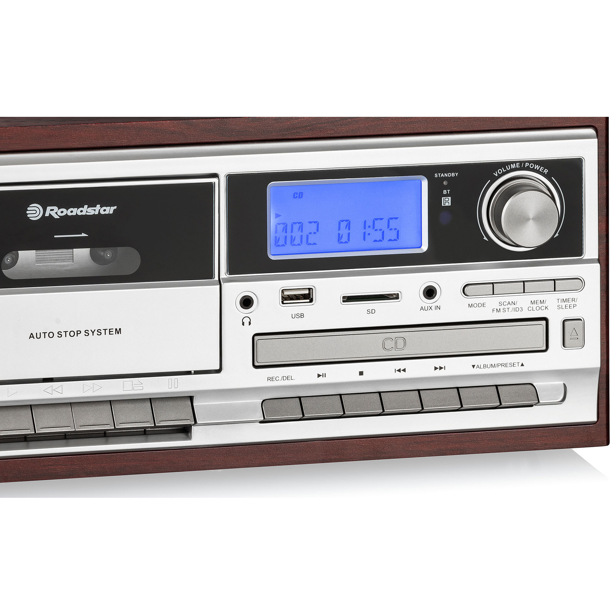 Una radio vintage con reproductor de casetes, pantalla y botones de control. La marca es Roadstar.
