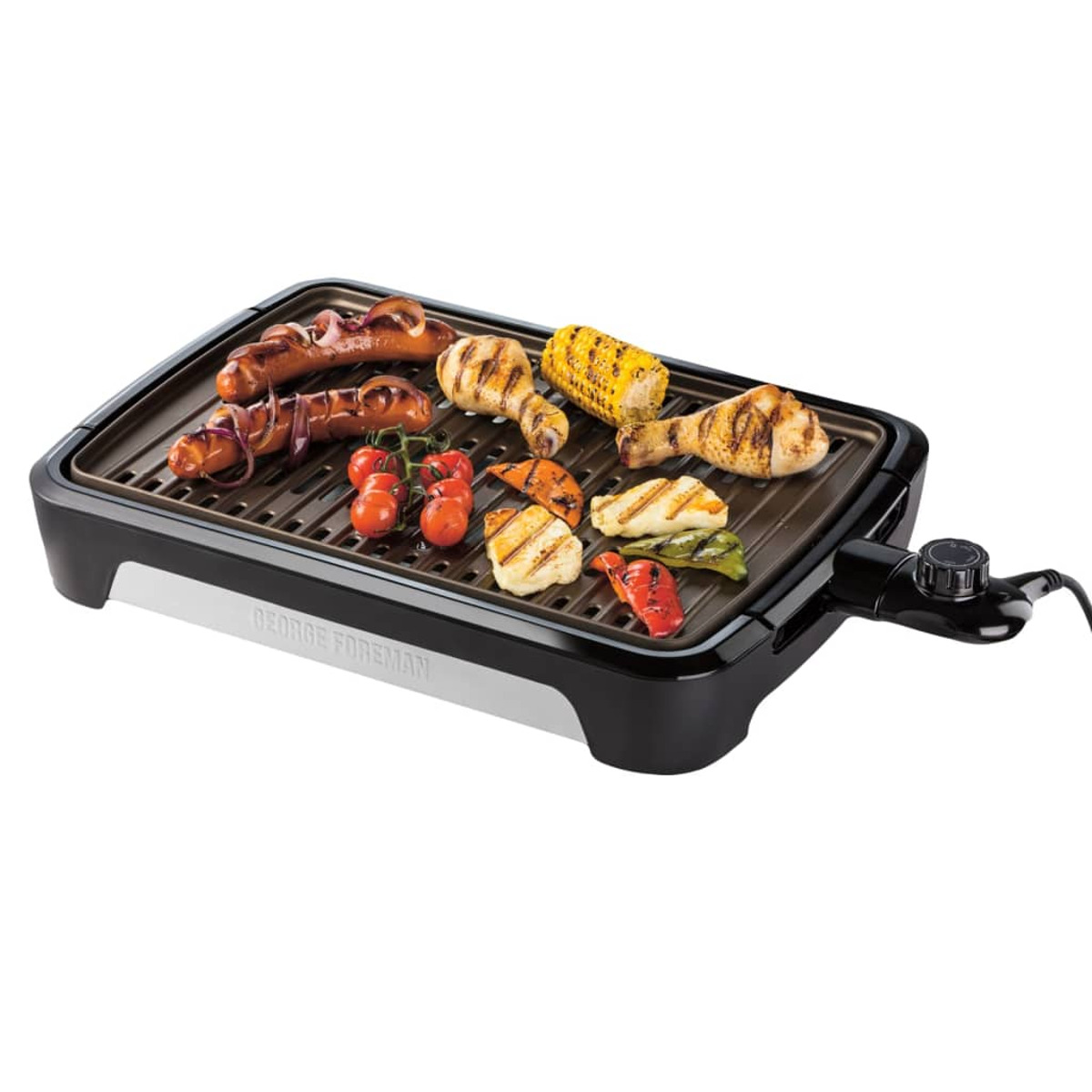 Griglia elettrica George Foreman con cibo grigliato: salsicce, verdure.