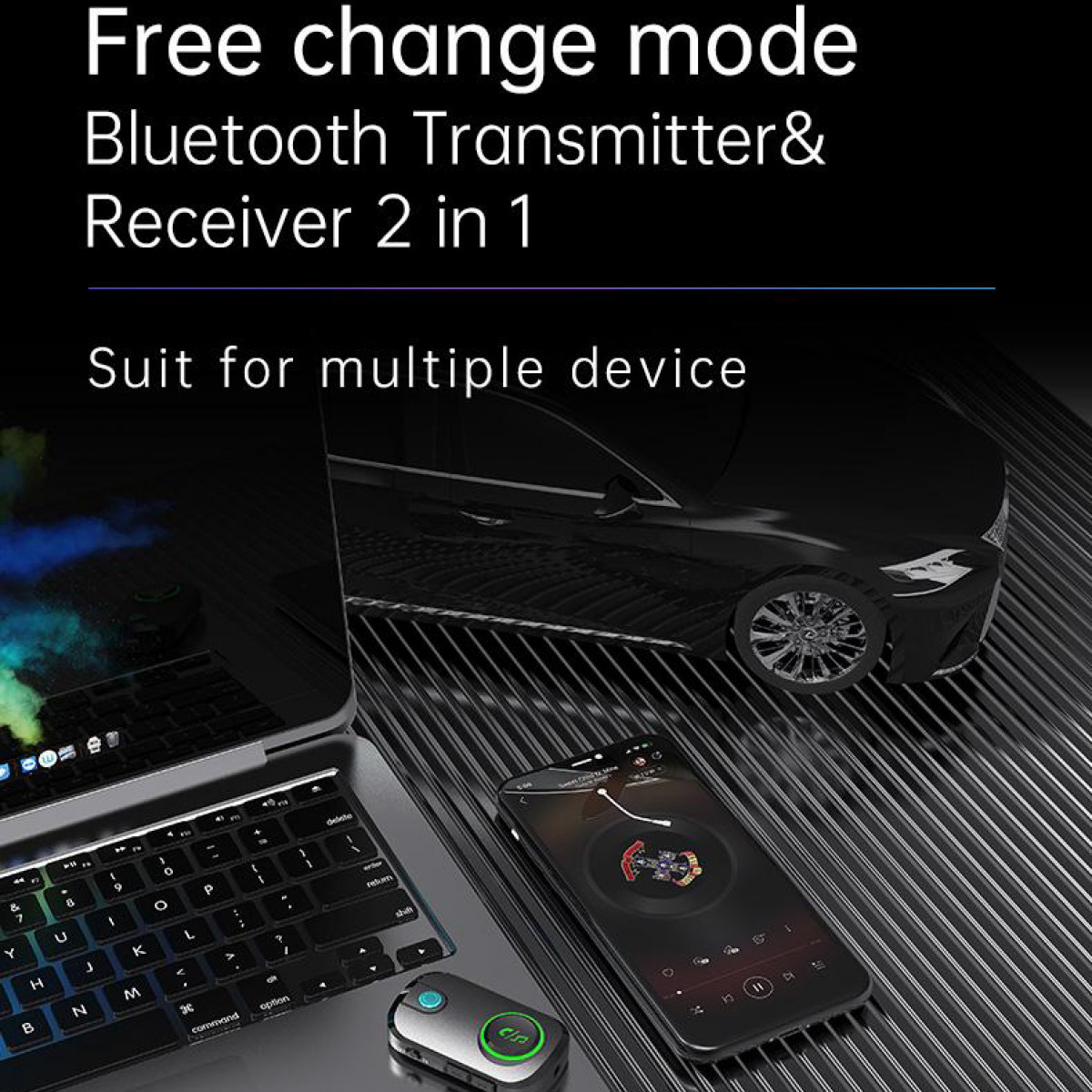 Laptop, smartfon i nadajnik Bluetooth znajdują się na wzorzystej powierzchni, a w tle samochód.